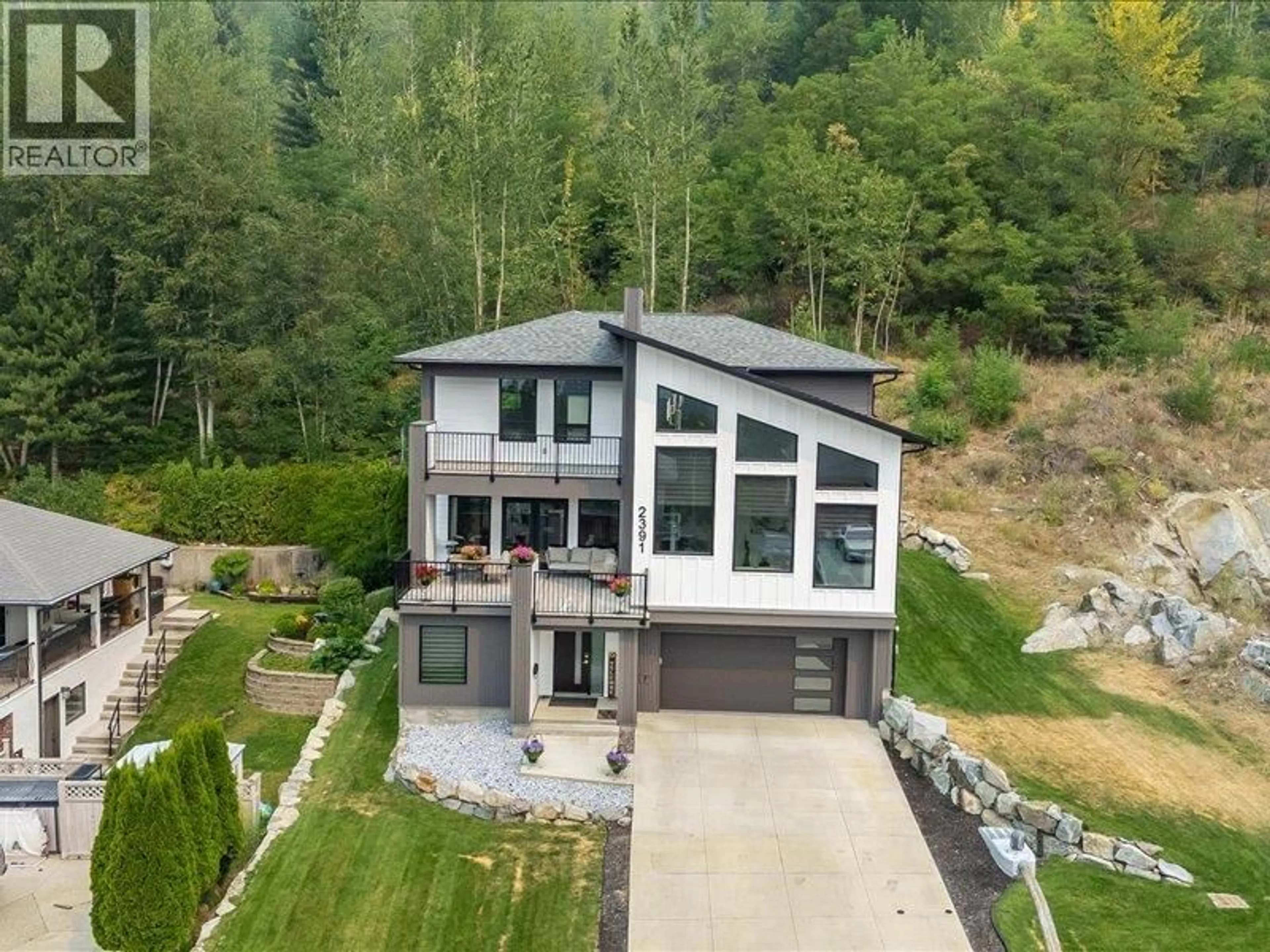 A pic from outside/outdoor area/front of a property/back of a property/a pic from drone, mountain view for 2391 MCBRIDE STREET, Trail British Columbia V1R3A6