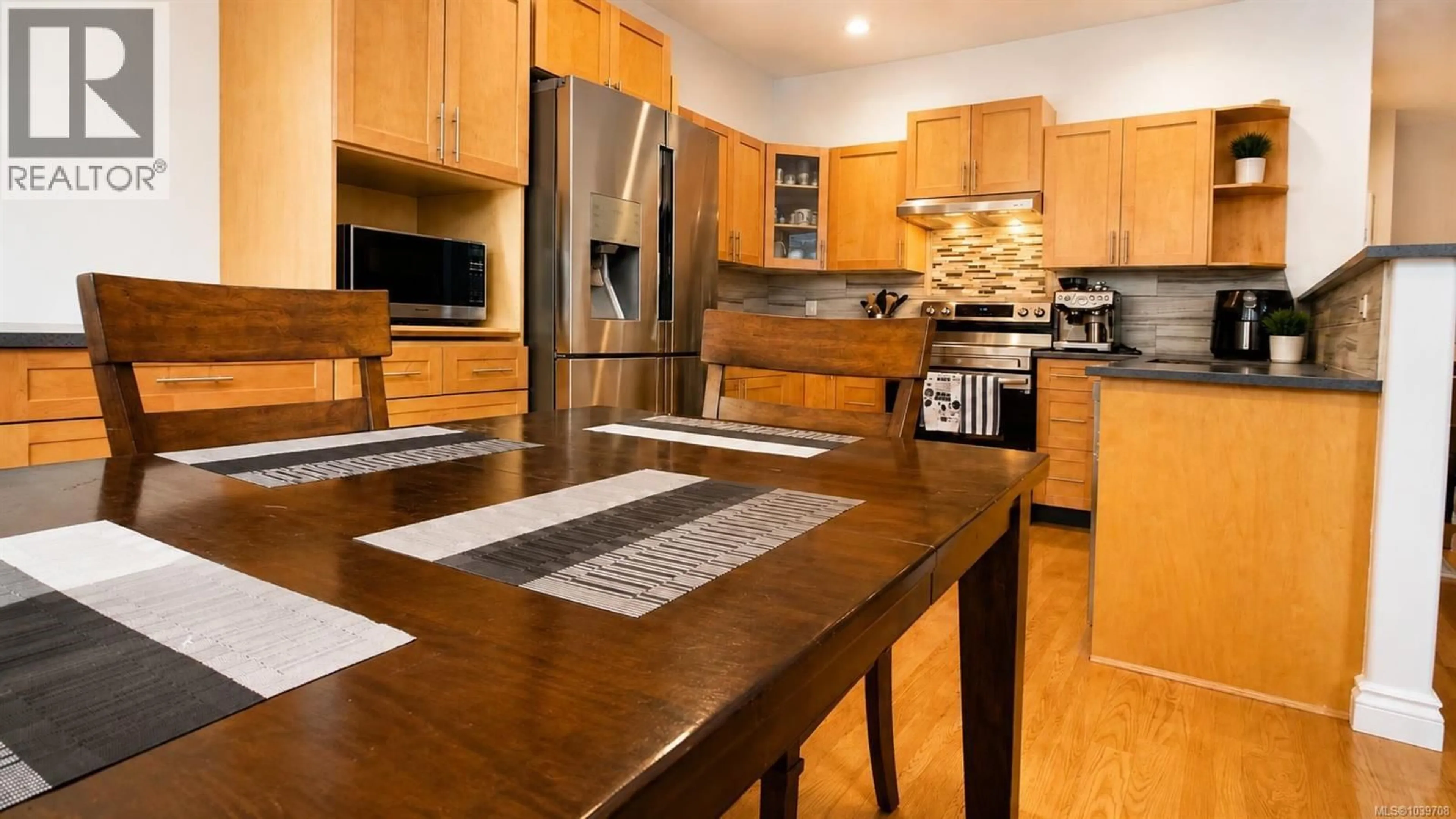Open concept kitchen, wood/laminate floor for 224 JOHEL ROAD, Lake Cowichan British Columbia V0R2G0