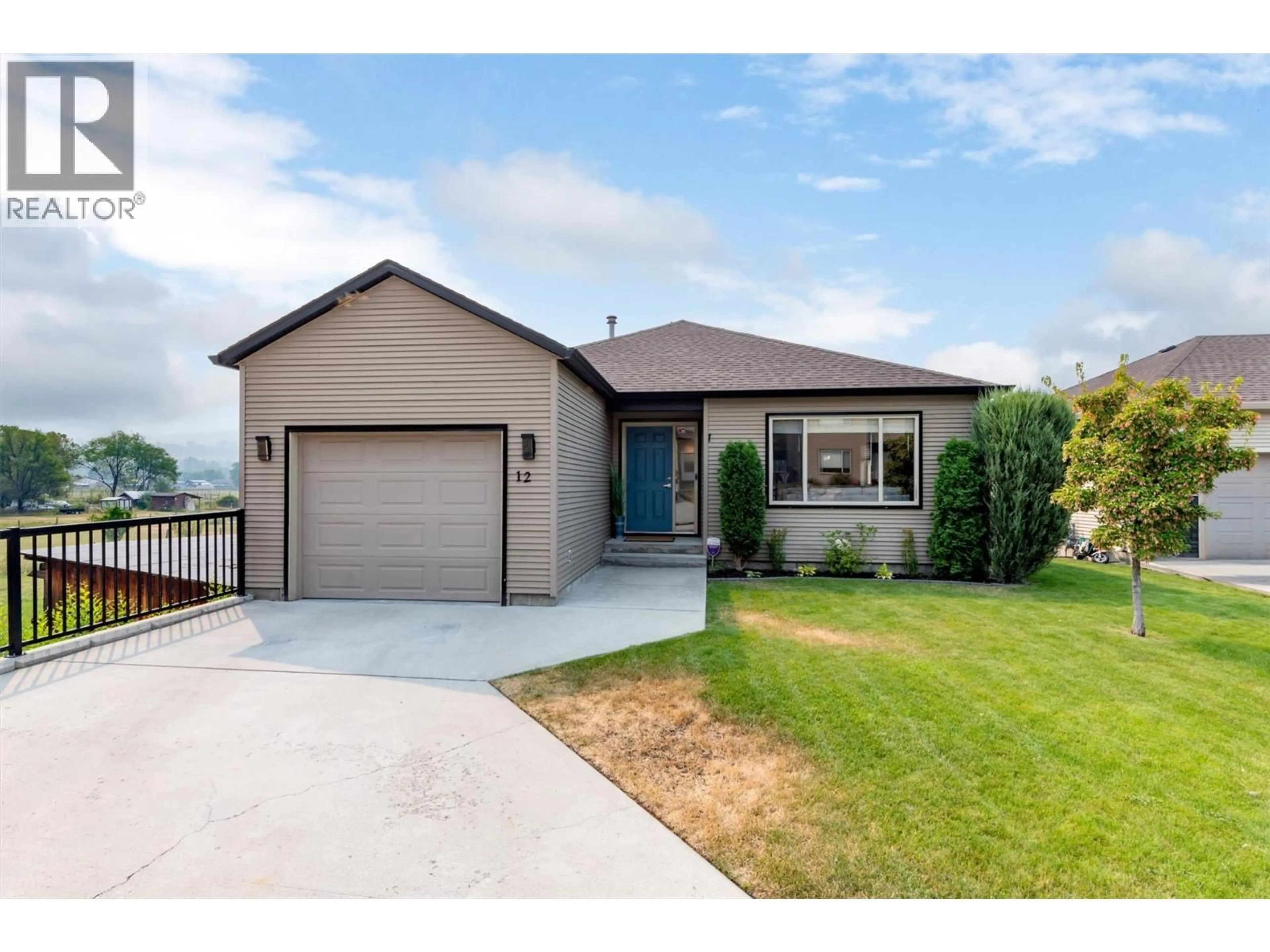 Home with brick exterior material, street for 12 - 11392 LODGE ROAD, Lake Country British Columbia V4V1X2