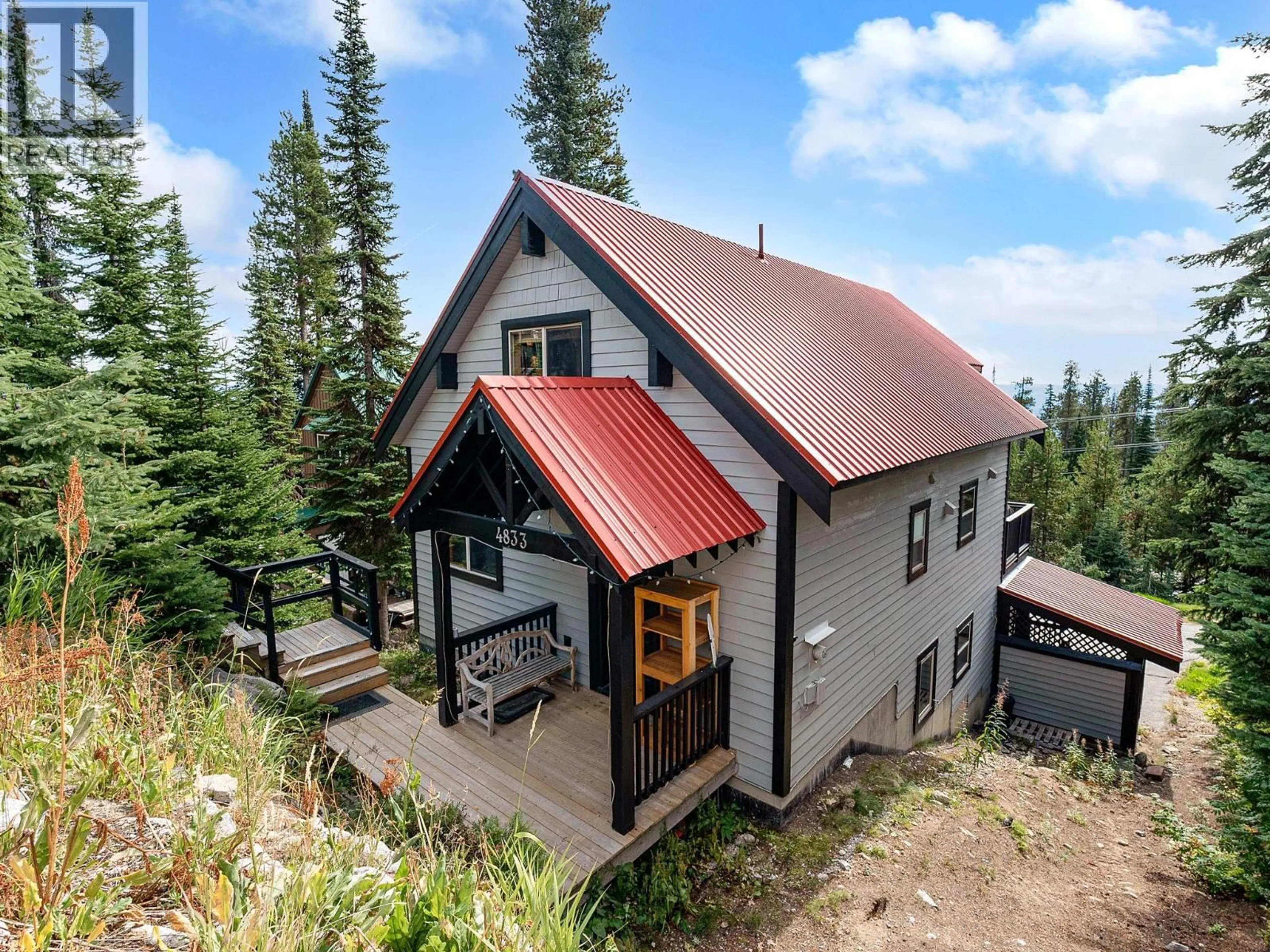 A pic from outside/outdoor area/front of a property/back of a property/a pic from drone, mountain view for 4833 SNOW PINES ROAD, Big White British Columbia V1P1T4