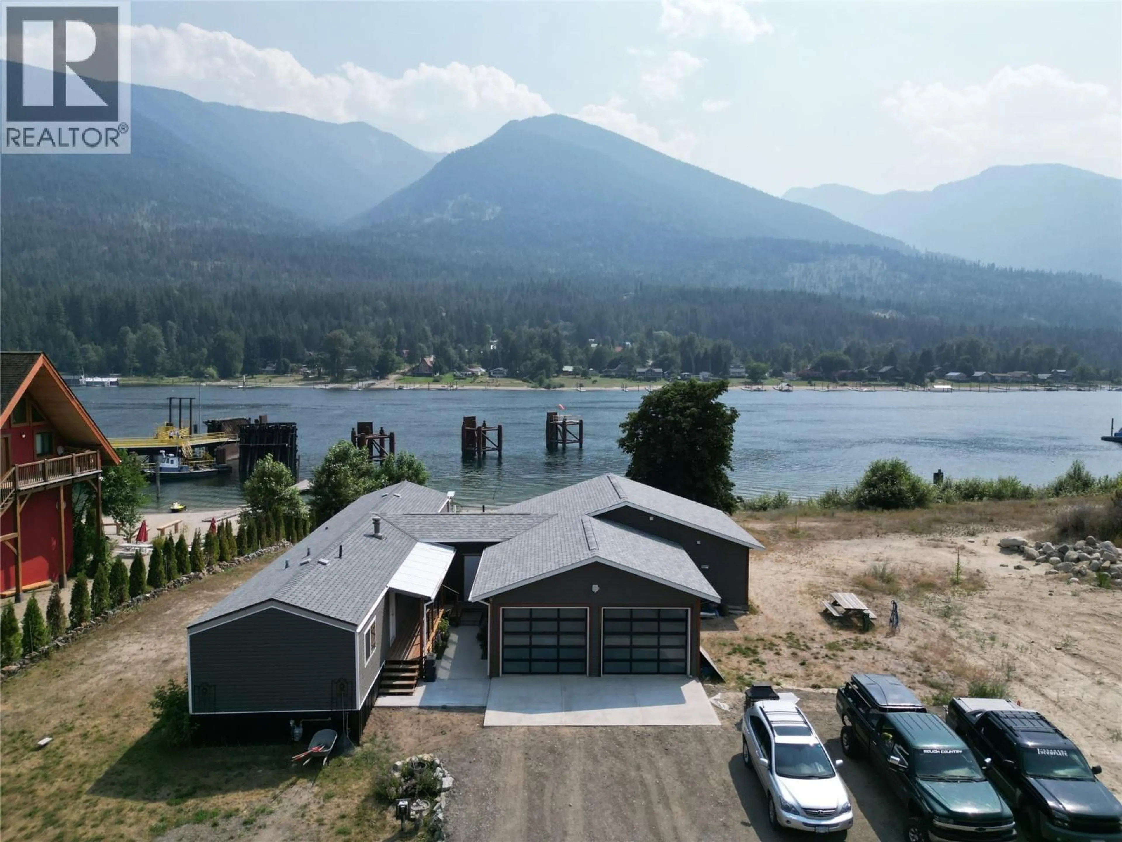 A pic from outside/outdoor area/front of a property/back of a property/a pic from drone, water/lake/river/ocean view for 7920 BALFOUR WHARF ROAD, Balfour British Columbia V0G1C0