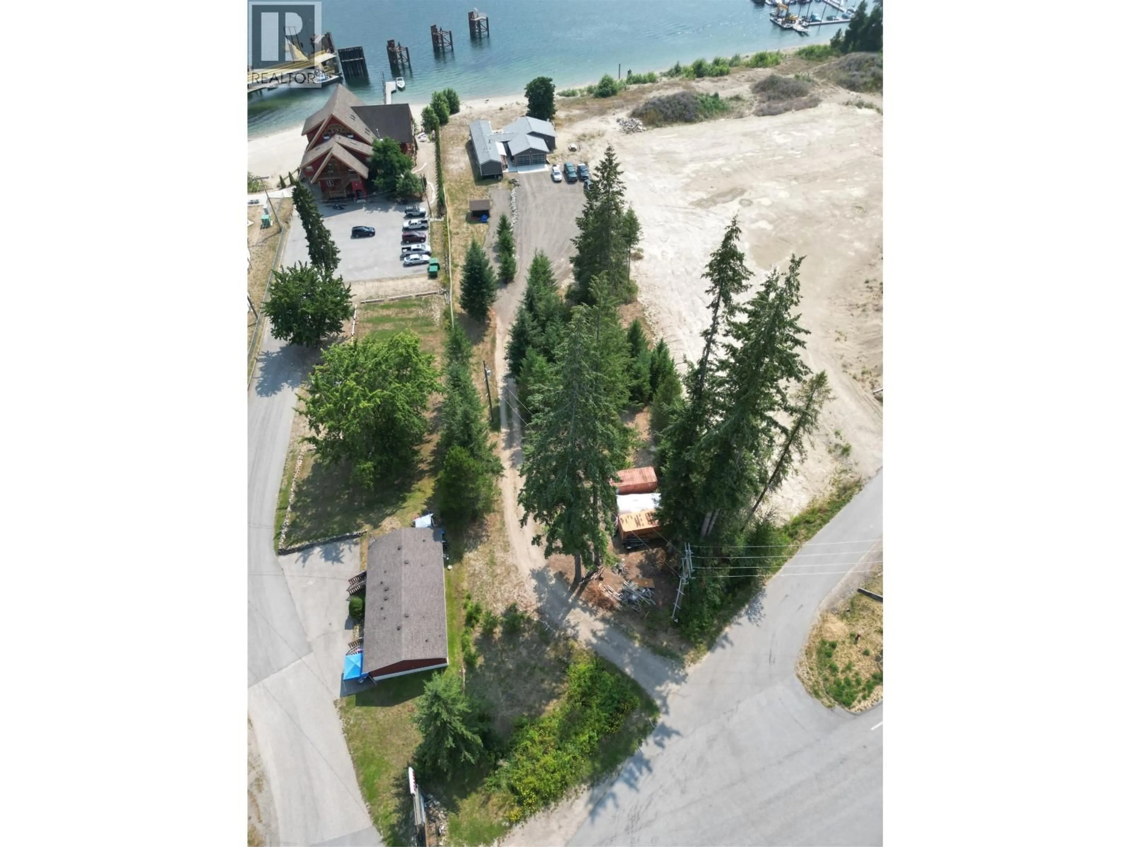 A pic from outside/outdoor area/front of a property/back of a property/a pic from drone, water/lake/river/ocean view for 7920 BALFOUR WHARF ROAD, Balfour British Columbia V0G1C0