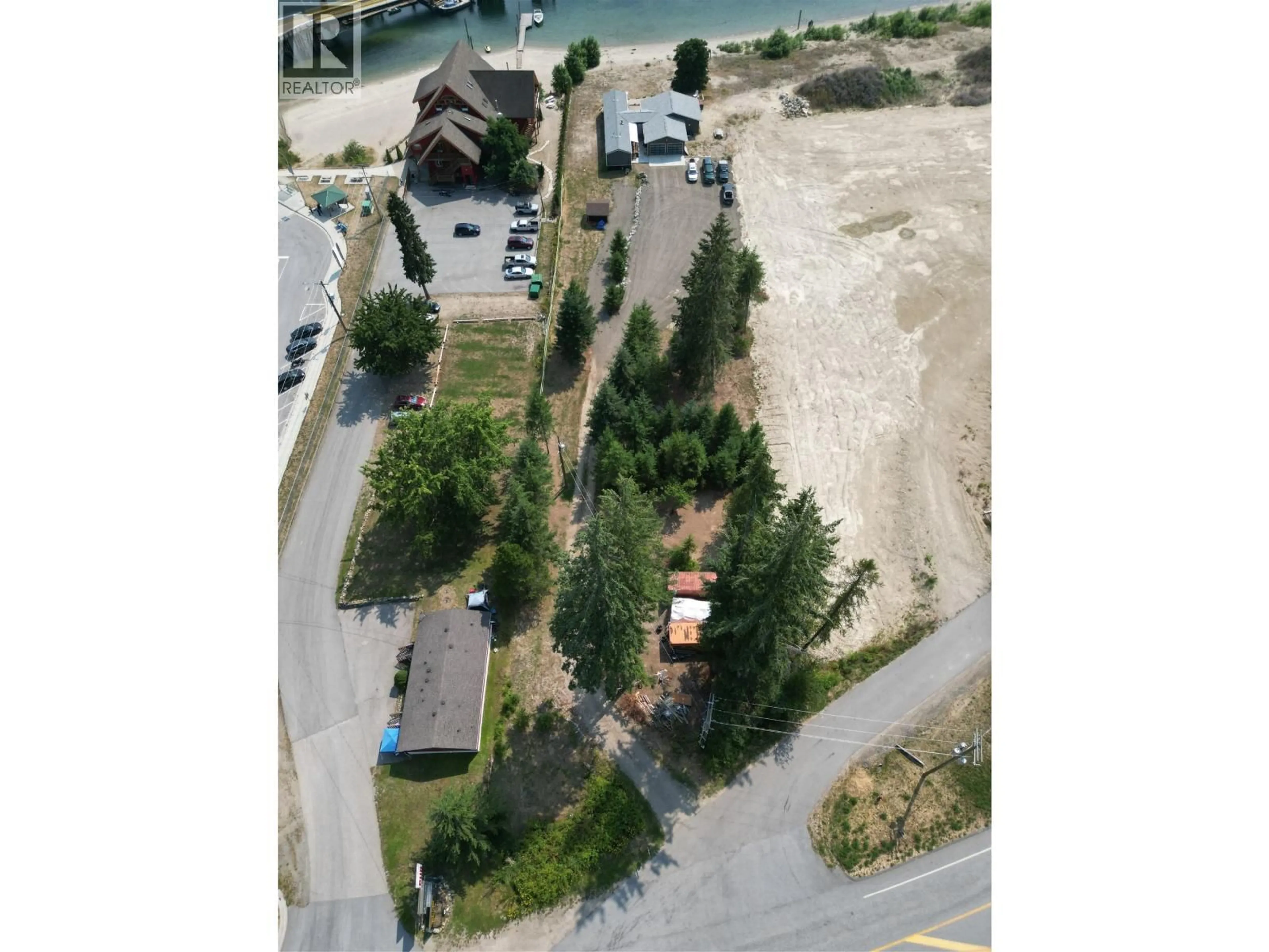 A pic from outside/outdoor area/front of a property/back of a property/a pic from drone, street for 7920 BALFOUR WHARF ROAD, Balfour British Columbia V0G1C0