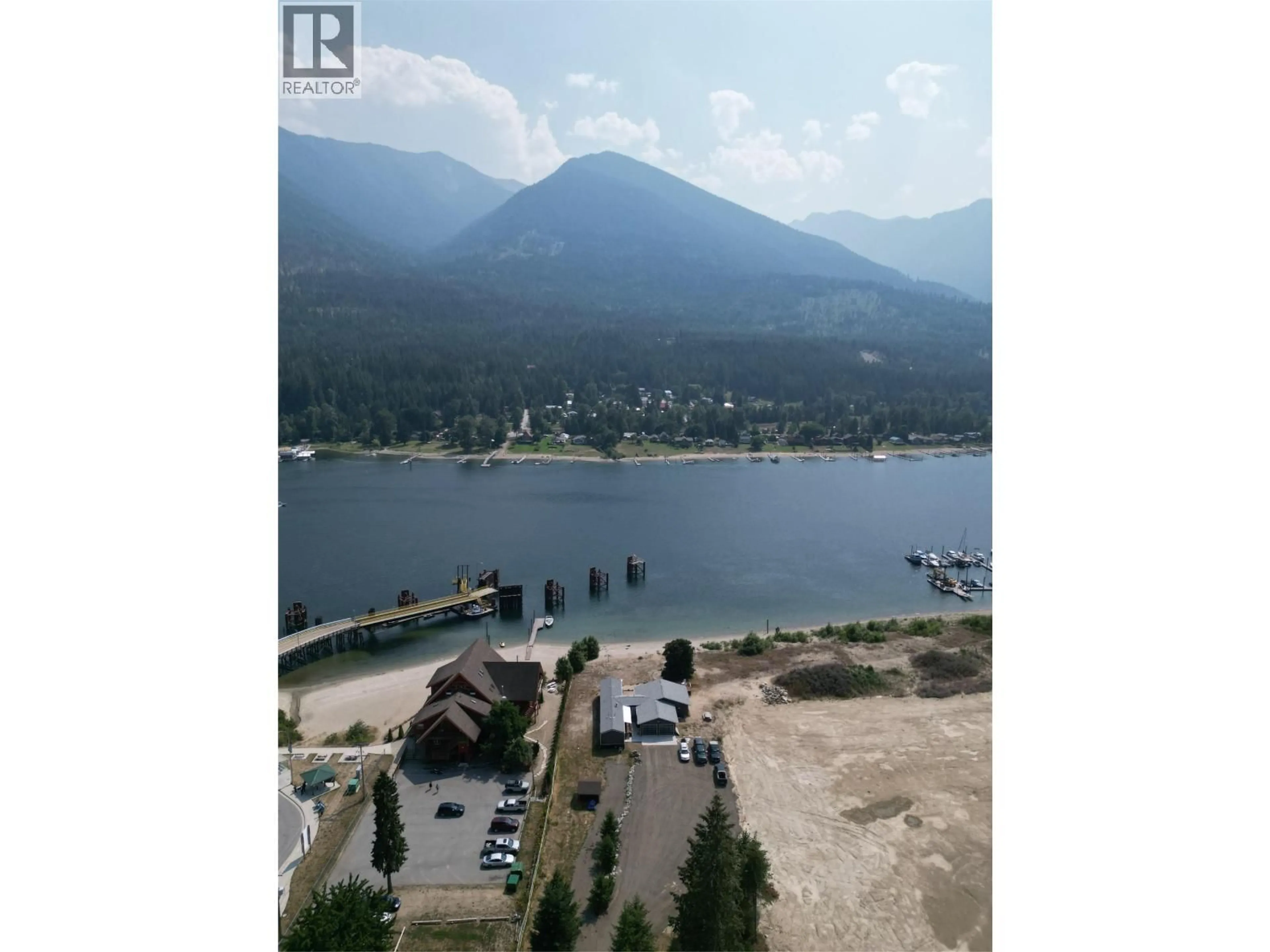A pic from outside/outdoor area/front of a property/back of a property/a pic from drone, water/lake/river/ocean view for 7920 BALFOUR WHARF ROAD, Balfour British Columbia V0G1C0