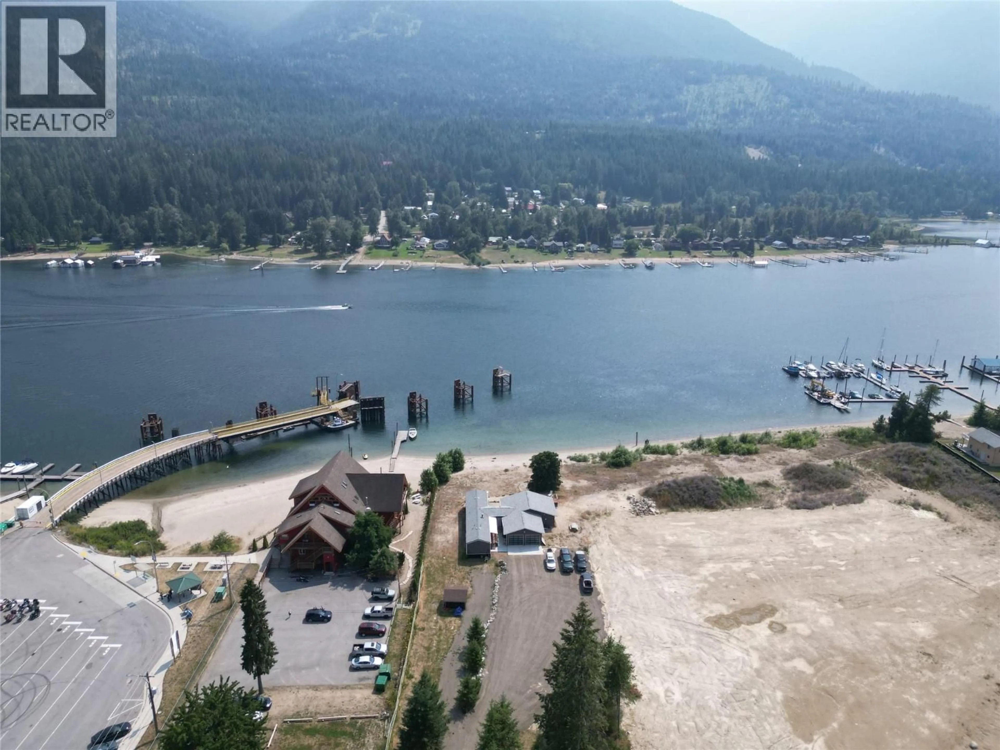 A pic from outside/outdoor area/front of a property/back of a property/a pic from drone, water/lake/river/ocean view for 7920 BALFOUR WHARF ROAD, Balfour British Columbia V0G1C0