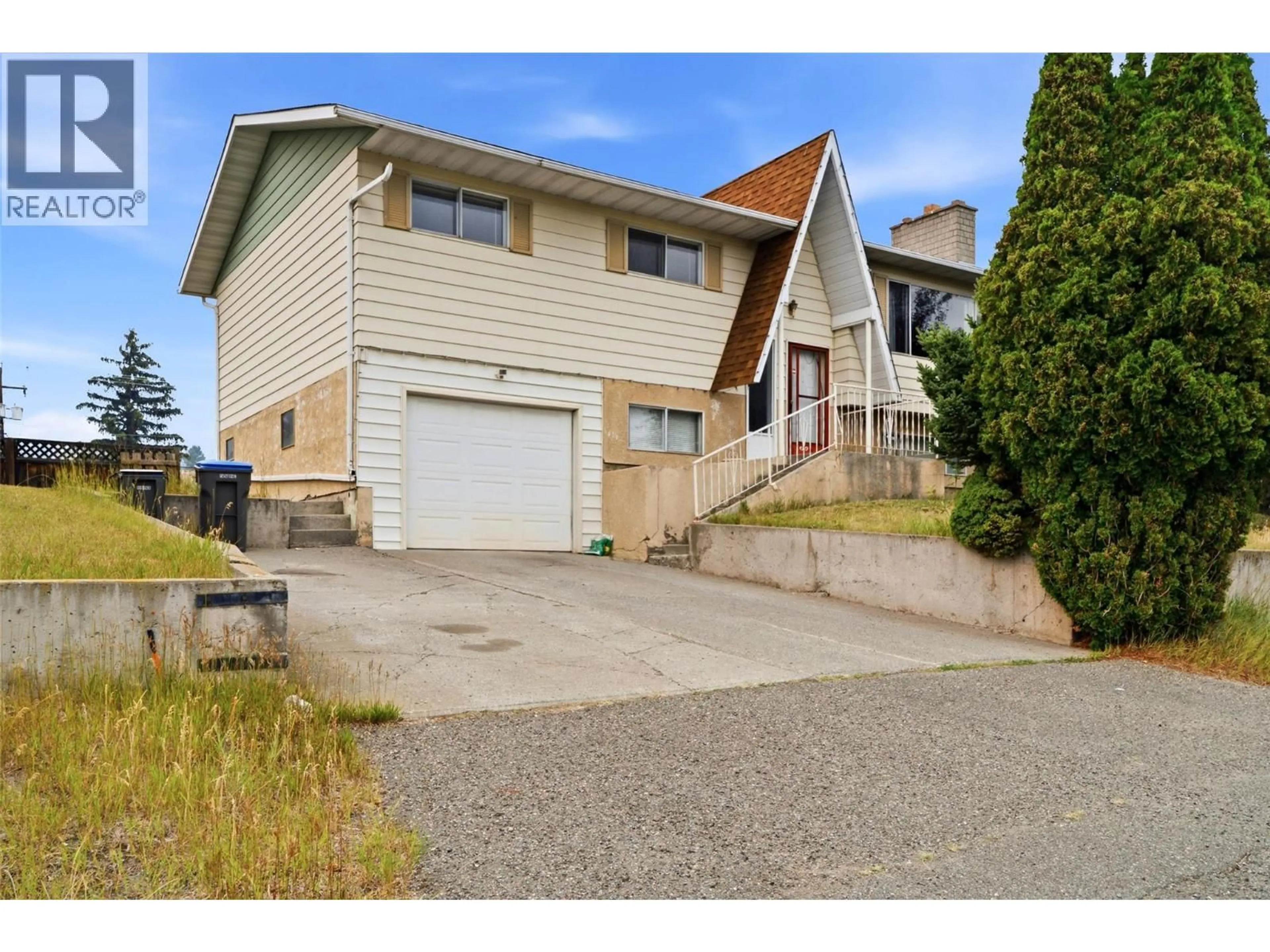 Home with vinyl exterior material, street for 2475 IRVINE AVENUE, Merritt British Columbia V1K1H4