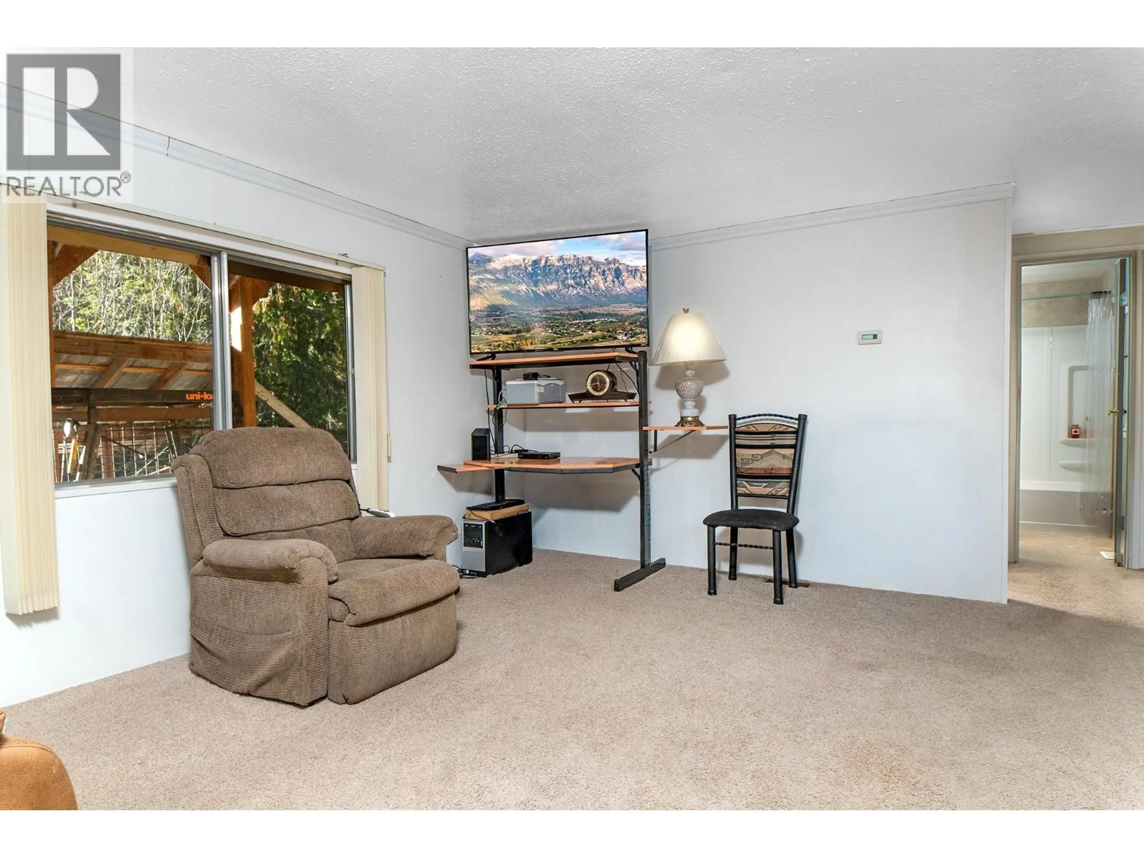 Living room with furniture, unknown for 4717 GOAT RIVER NORTH ROAD, Arrow Creek British Columbia V0B1G9
