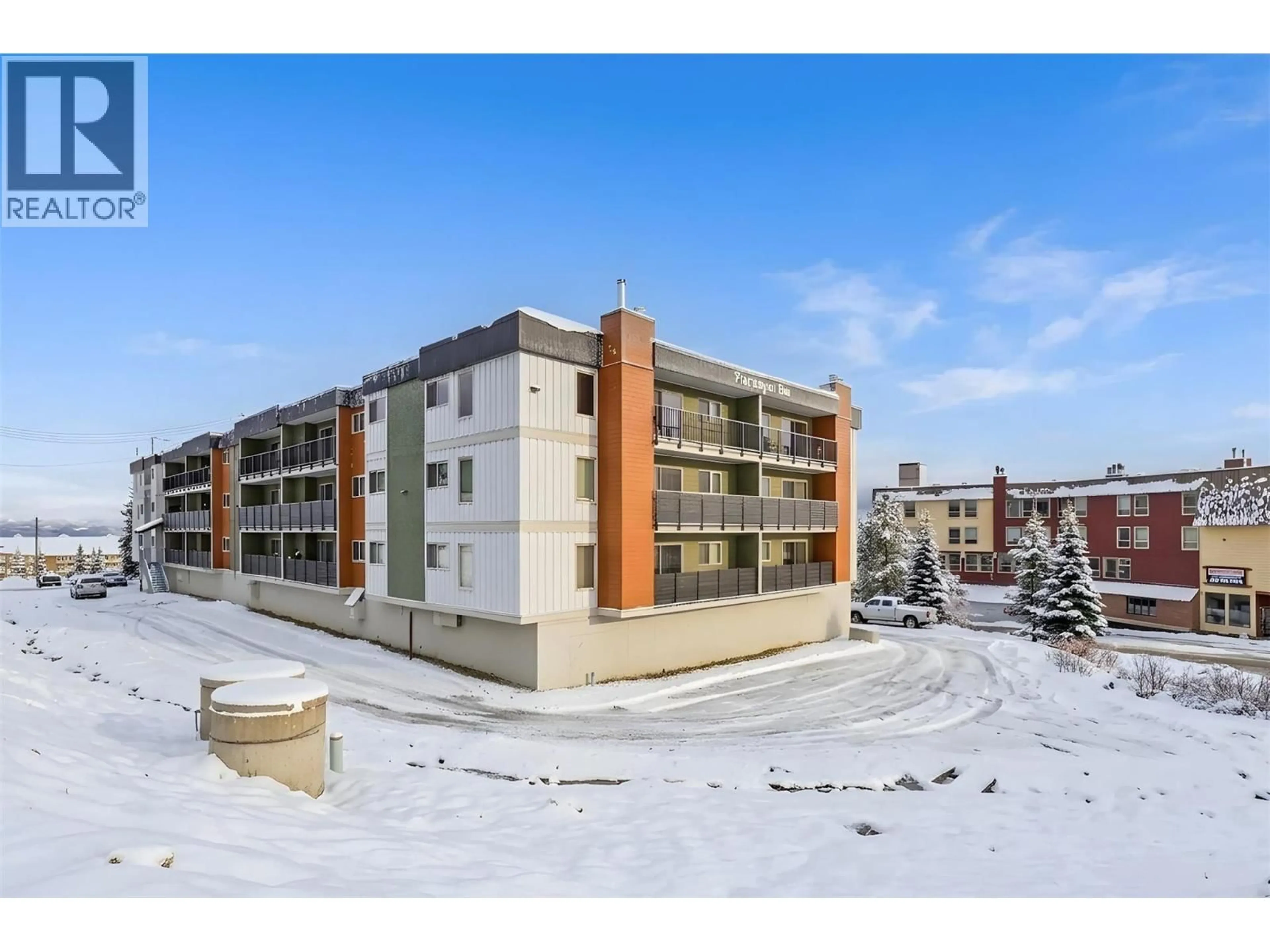 A pic from outside/outdoor area/front of a property/back of a property/a pic from drone, building for 302 - 6430 WHISKEY JACK ROAD, Big White British Columbia V1P1T4