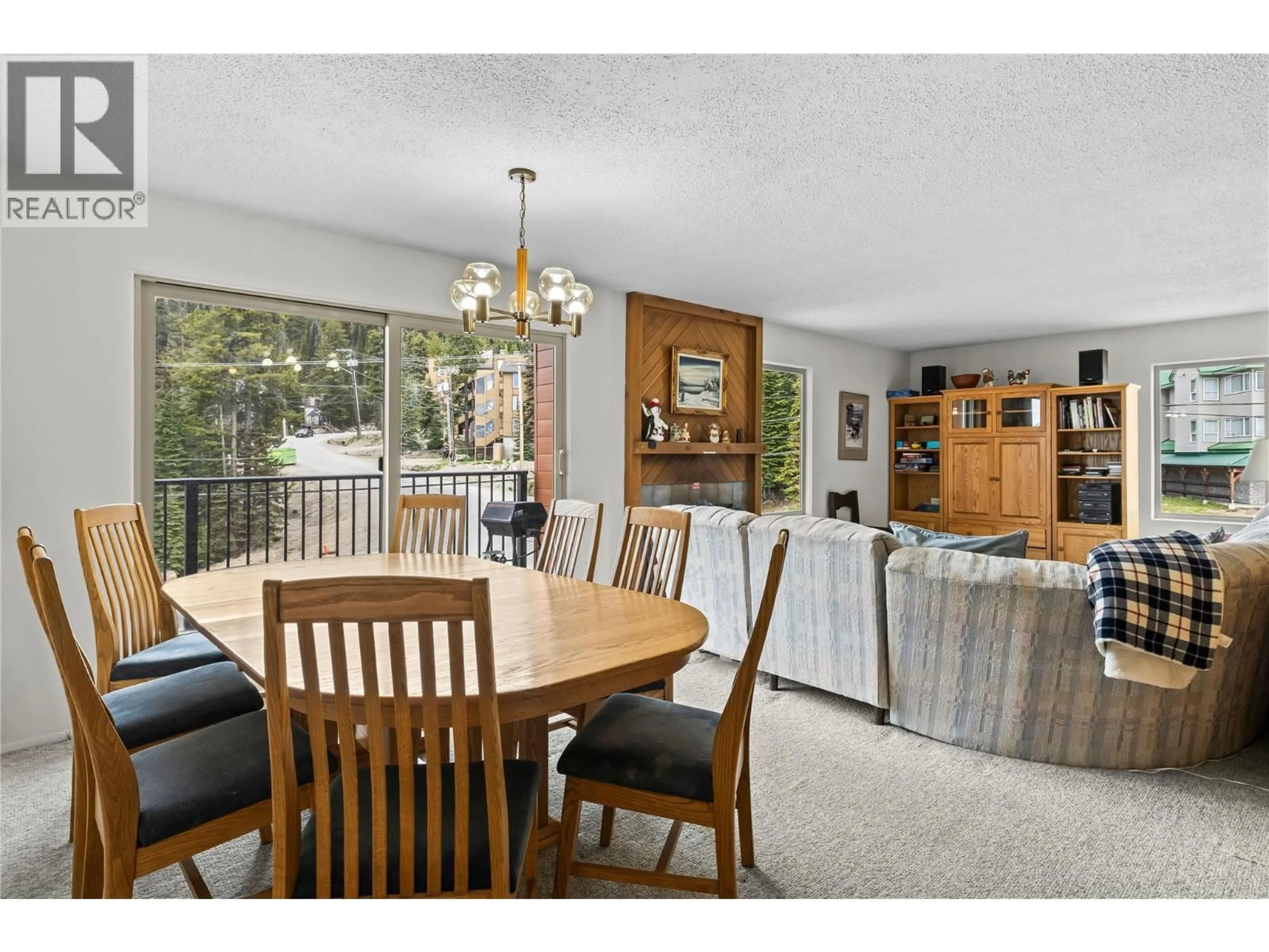 Dining room, wood/laminate floor for 302 - 6430 WHISKEY JACK ROAD, Big White British Columbia V1P1T4
