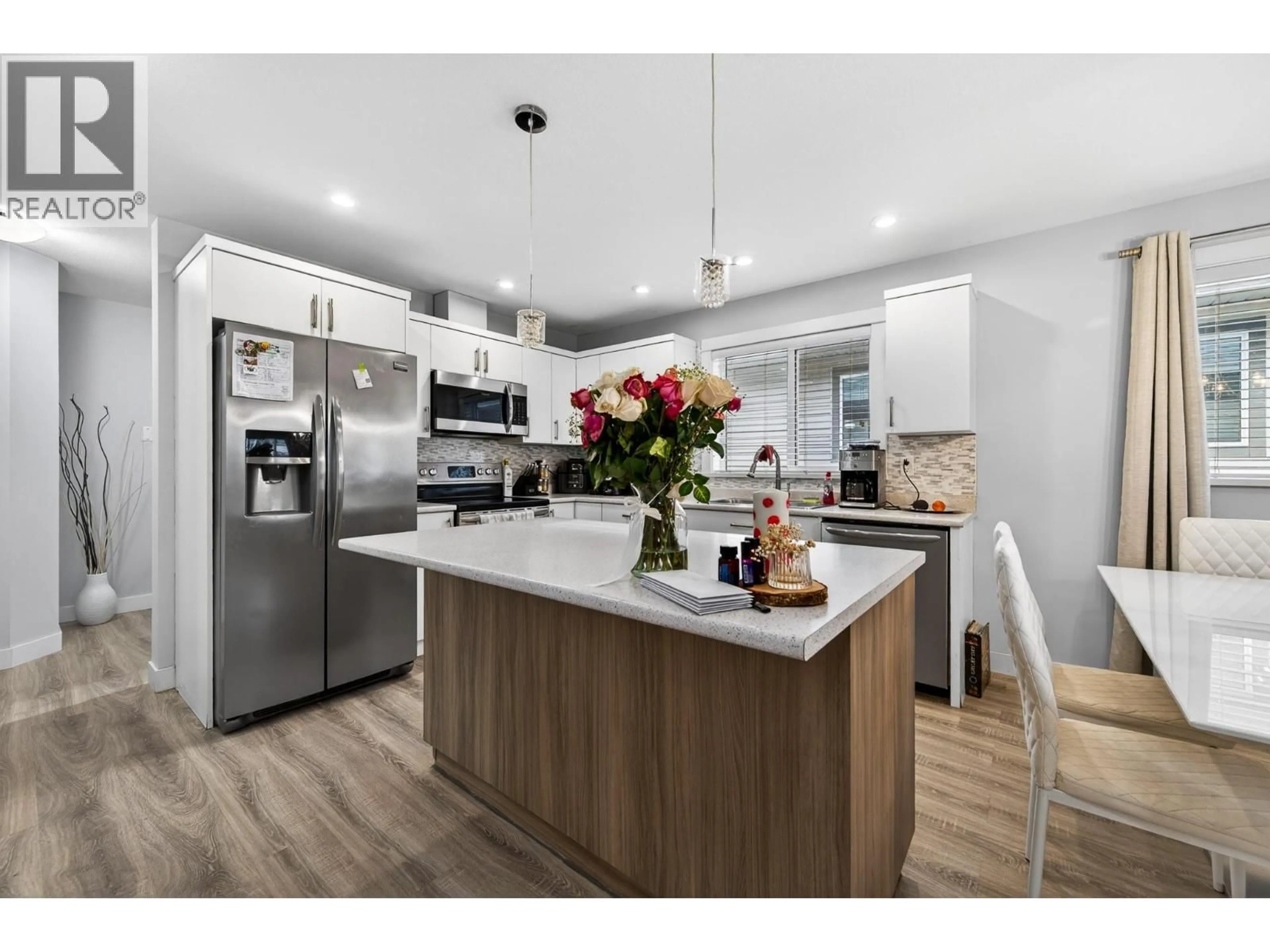 Open concept kitchen, wood/laminate floor for 135 - 8800 DALLAS DRIVE, Kamloops British Columbia V2C0G8