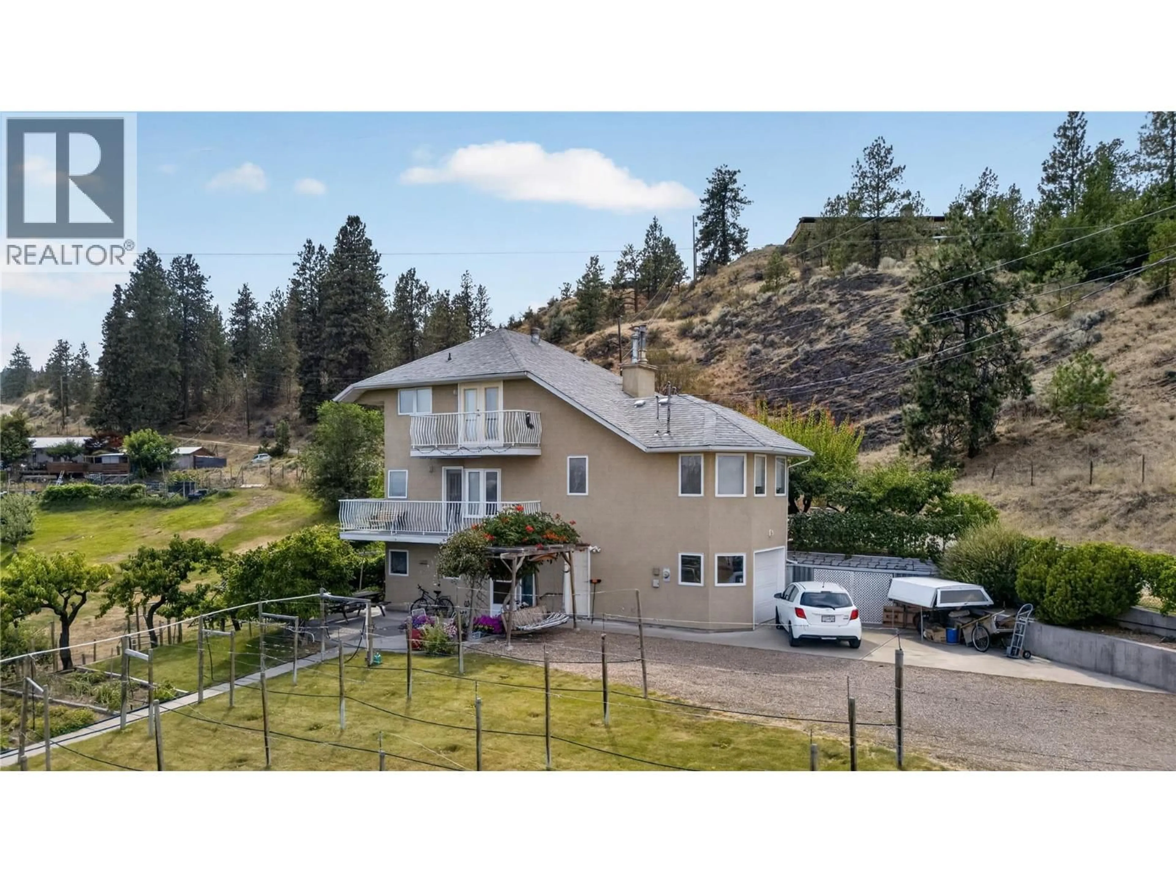 A pic from outside/outdoor area/front of a property/back of a property/a pic from drone, mountain view for 119 DOGWOOD AVENUE, Kaleden British Columbia V0H1K0