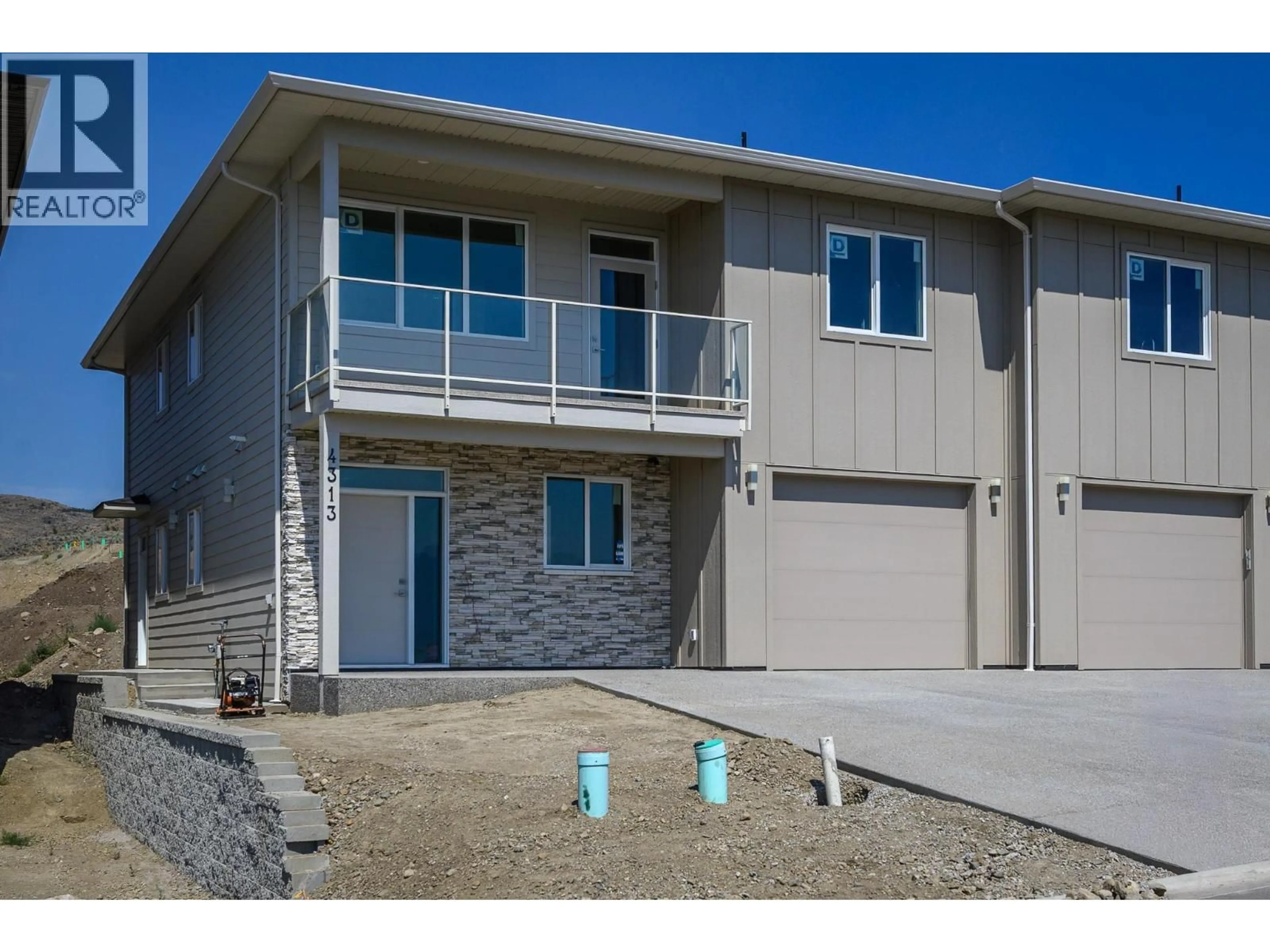 Home with vinyl exterior material, street for 4313 PAINTED TURTLE DRIVE, Vernon British Columbia V1H1A2