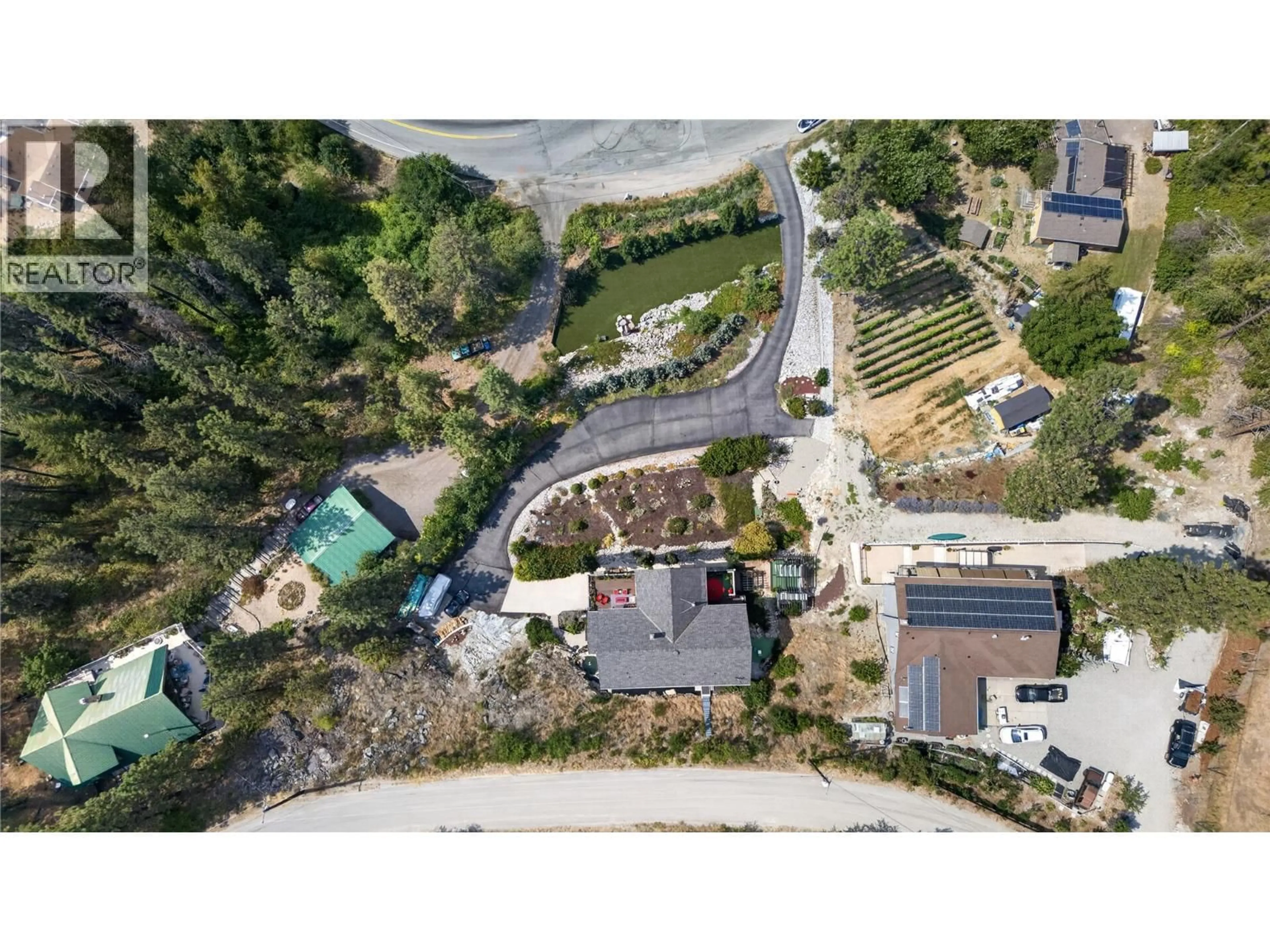 A pic from outside/outdoor area/front of a property/back of a property/a pic from drone, street for 3264 NARAMATA ROAD, Naramata British Columbia V0H1N1