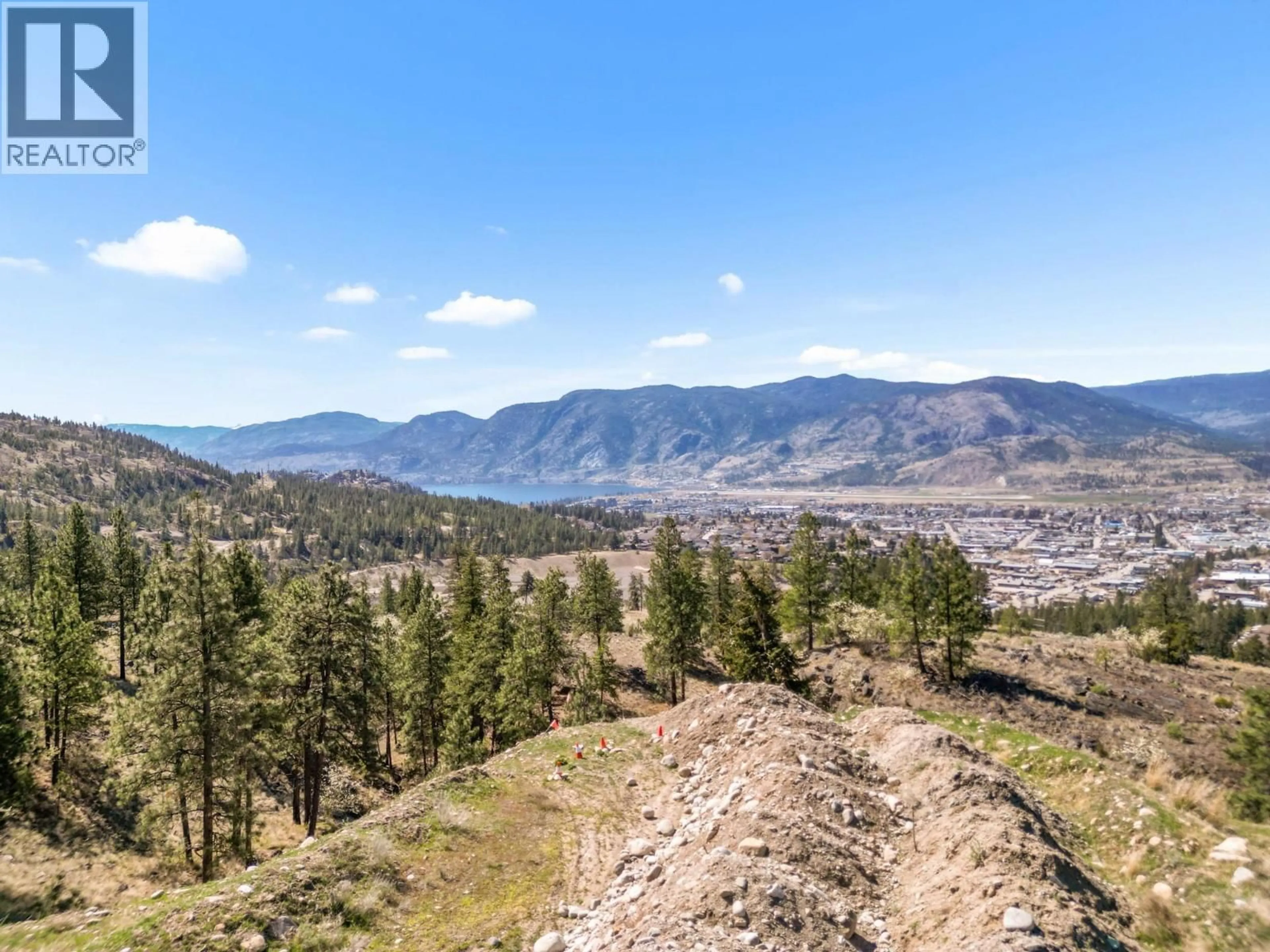 A pic from outside/outdoor area/front of a property/back of a property/a pic from drone, mountain view for 138 SALIKEN DRIVE, Penticton British Columbia V2A8V6