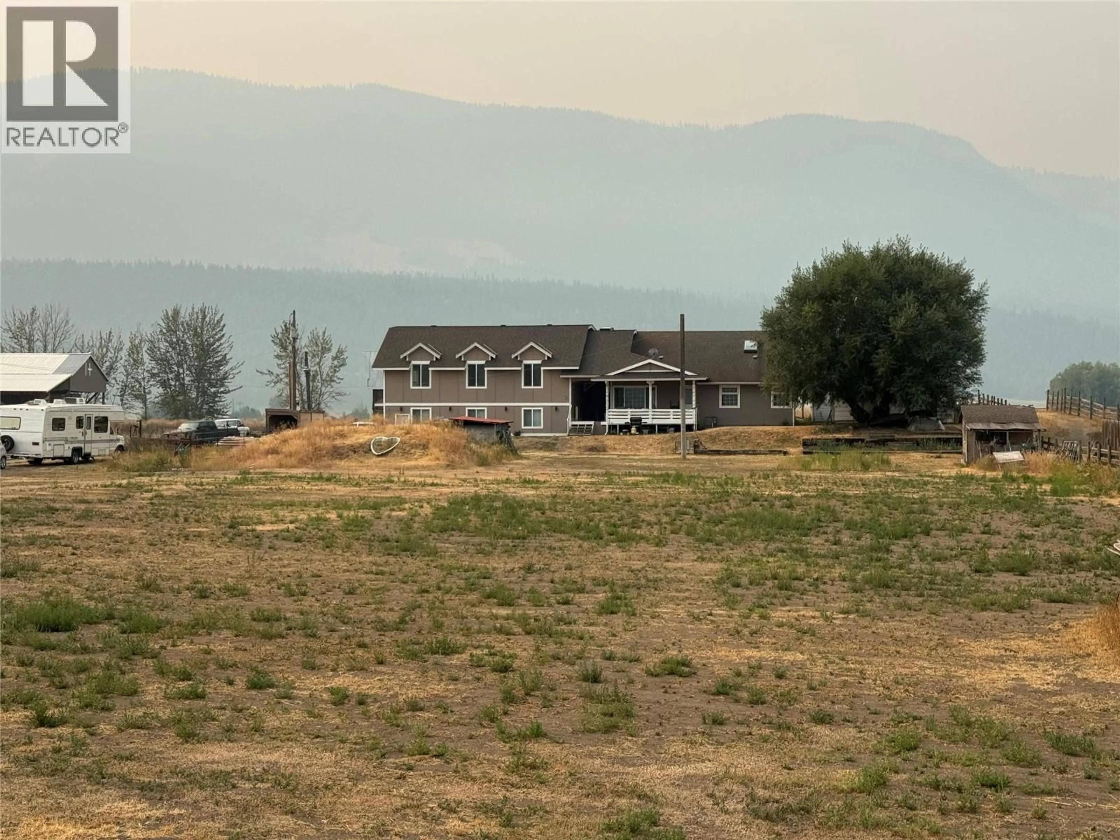 A pic from outside/outdoor area/front of a property/back of a property/a pic from drone, mountain view for 5556 VERNON/KAMLOOPS HIGHWAY, Westwold British Columbia V0E1W0