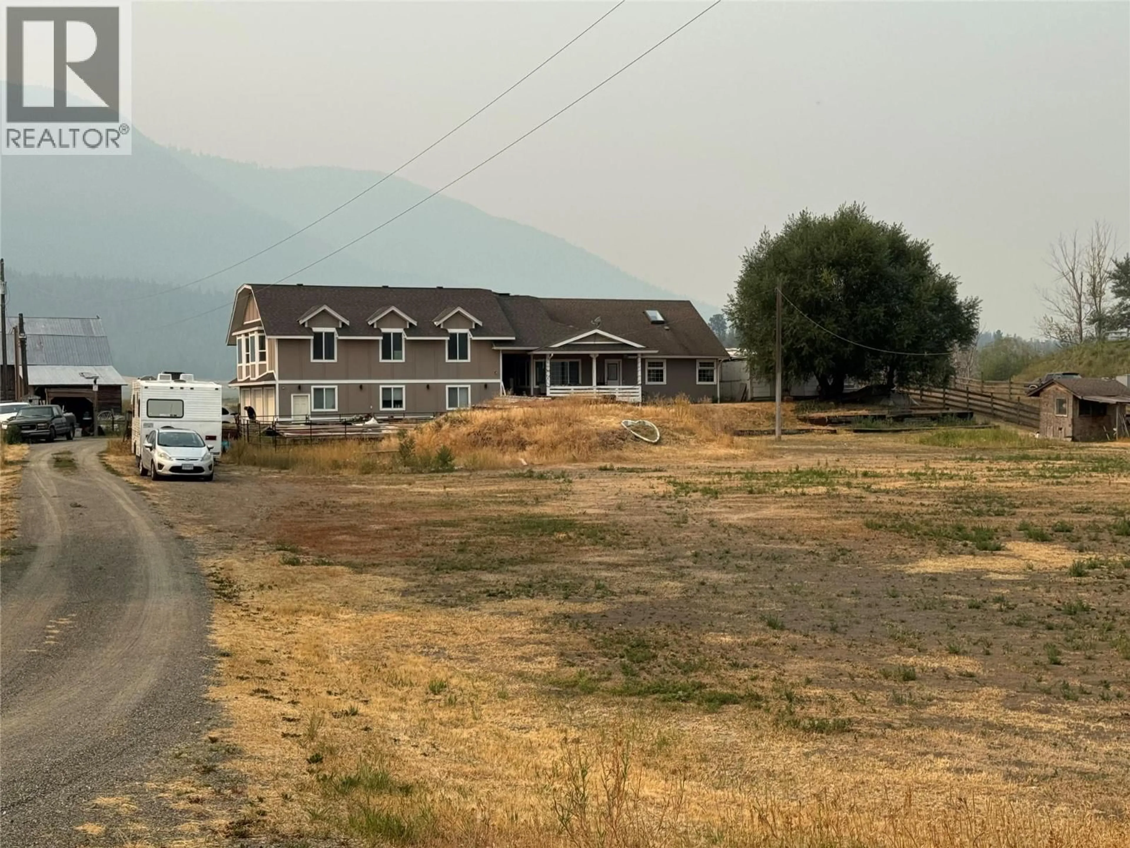 A pic from outside/outdoor area/front of a property/back of a property/a pic from drone, mountain view for 5556 VERNON/KAMLOOPS HIGHWAY, Westwold British Columbia V0E1W0