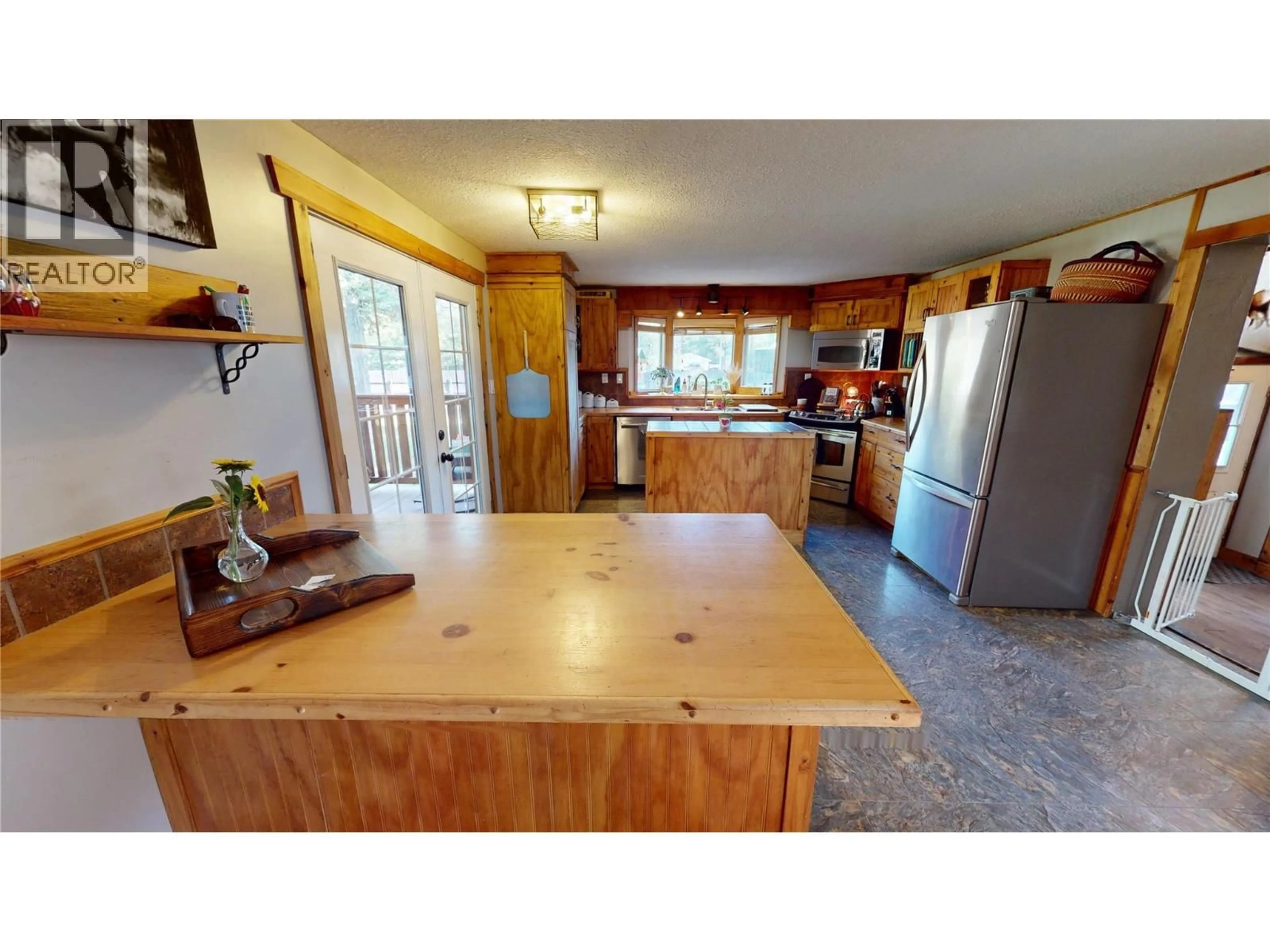Open concept kitchen, unknown for 7159 ROSEN LAKE ROAD, Jaffray British Columbia V0B1T0