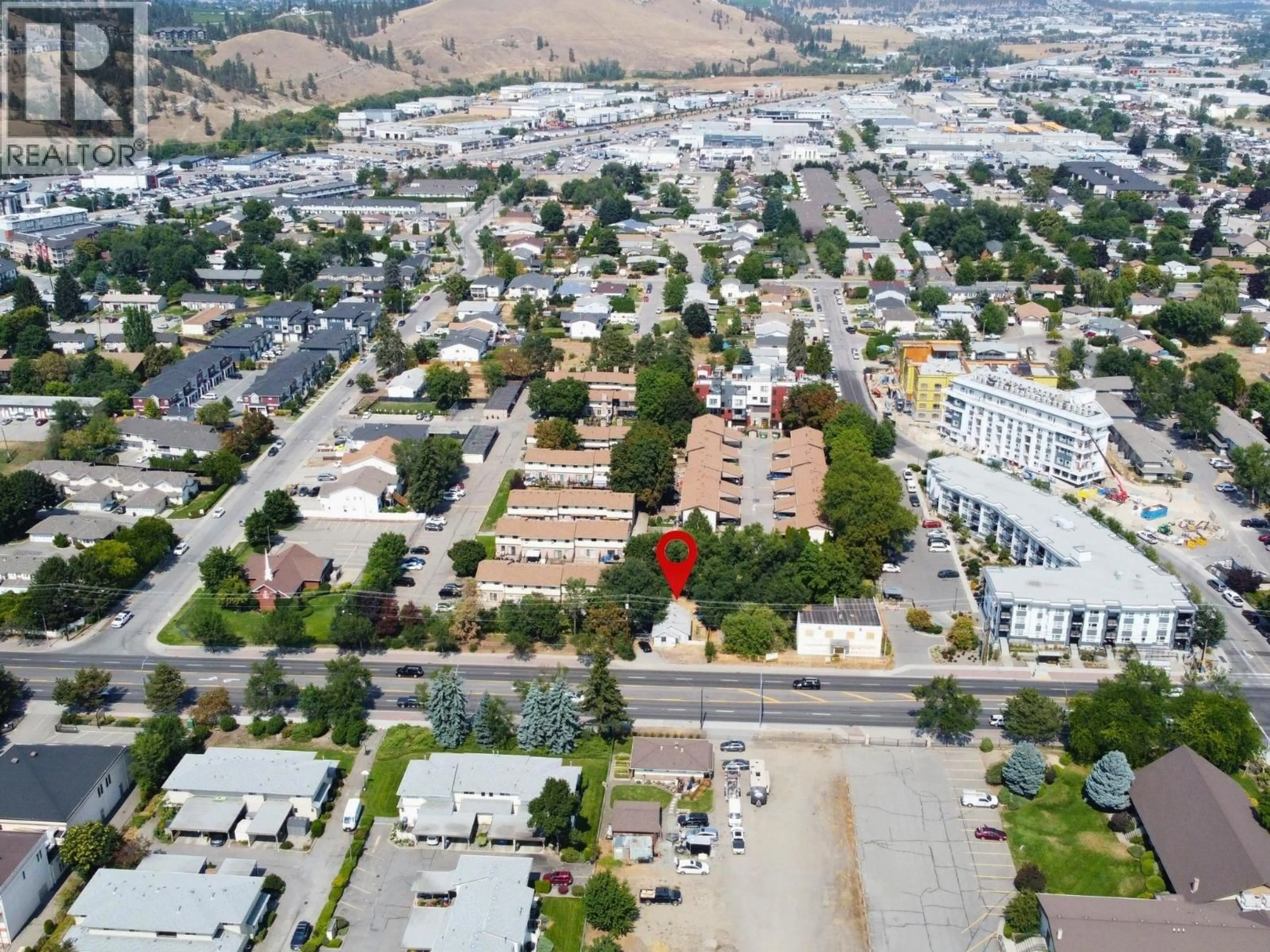 A pic from outside/outdoor area/front of a property/back of a property/a pic from drone, street for 1230 HIGHWAY 33 OTHER WEST, Kelowna British Columbia V1X1Z4