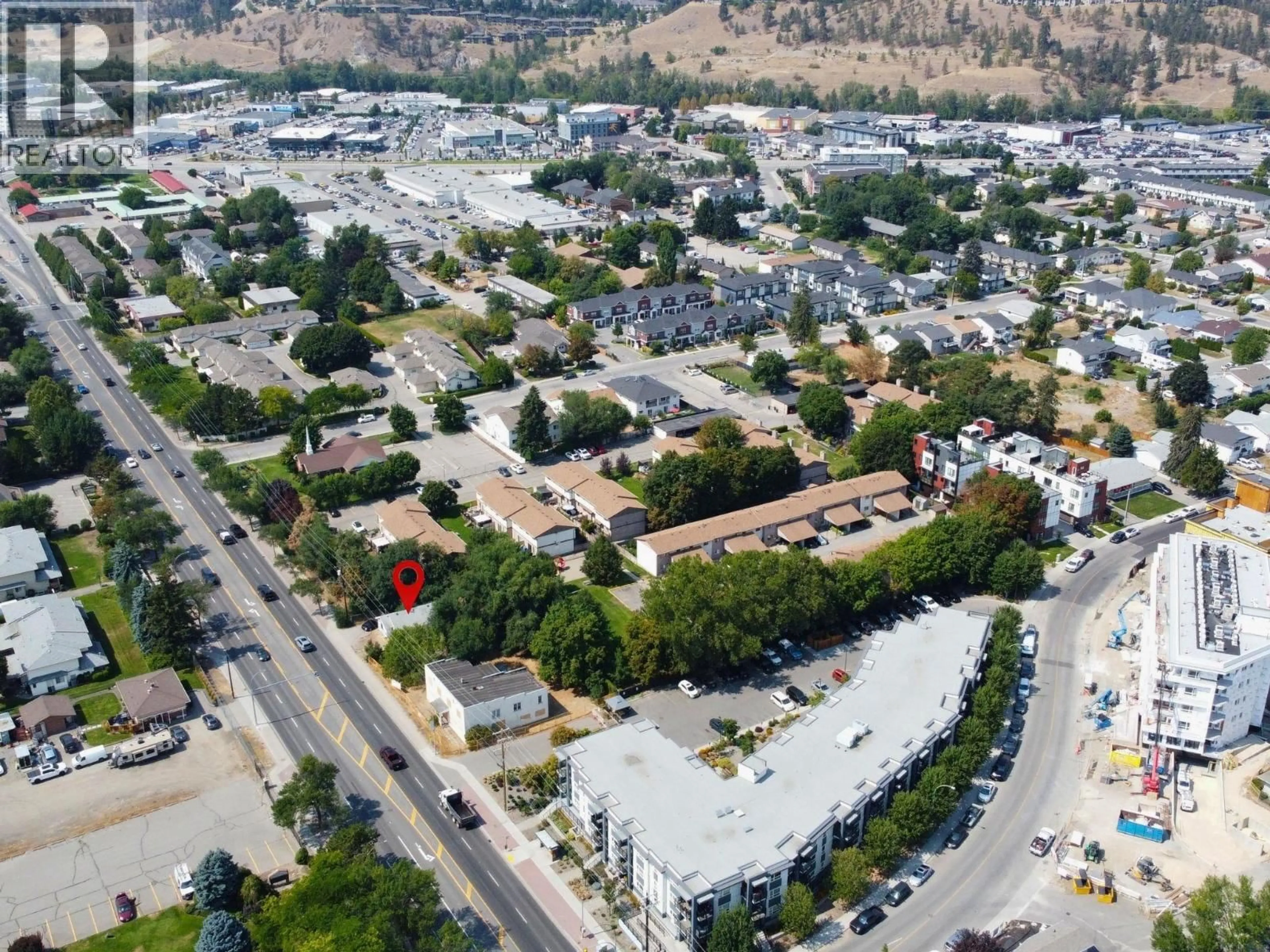 A pic from outside/outdoor area/front of a property/back of a property/a pic from drone, street for 1230 HIGHWAY 33 OTHER WEST, Kelowna British Columbia V1X1Z4