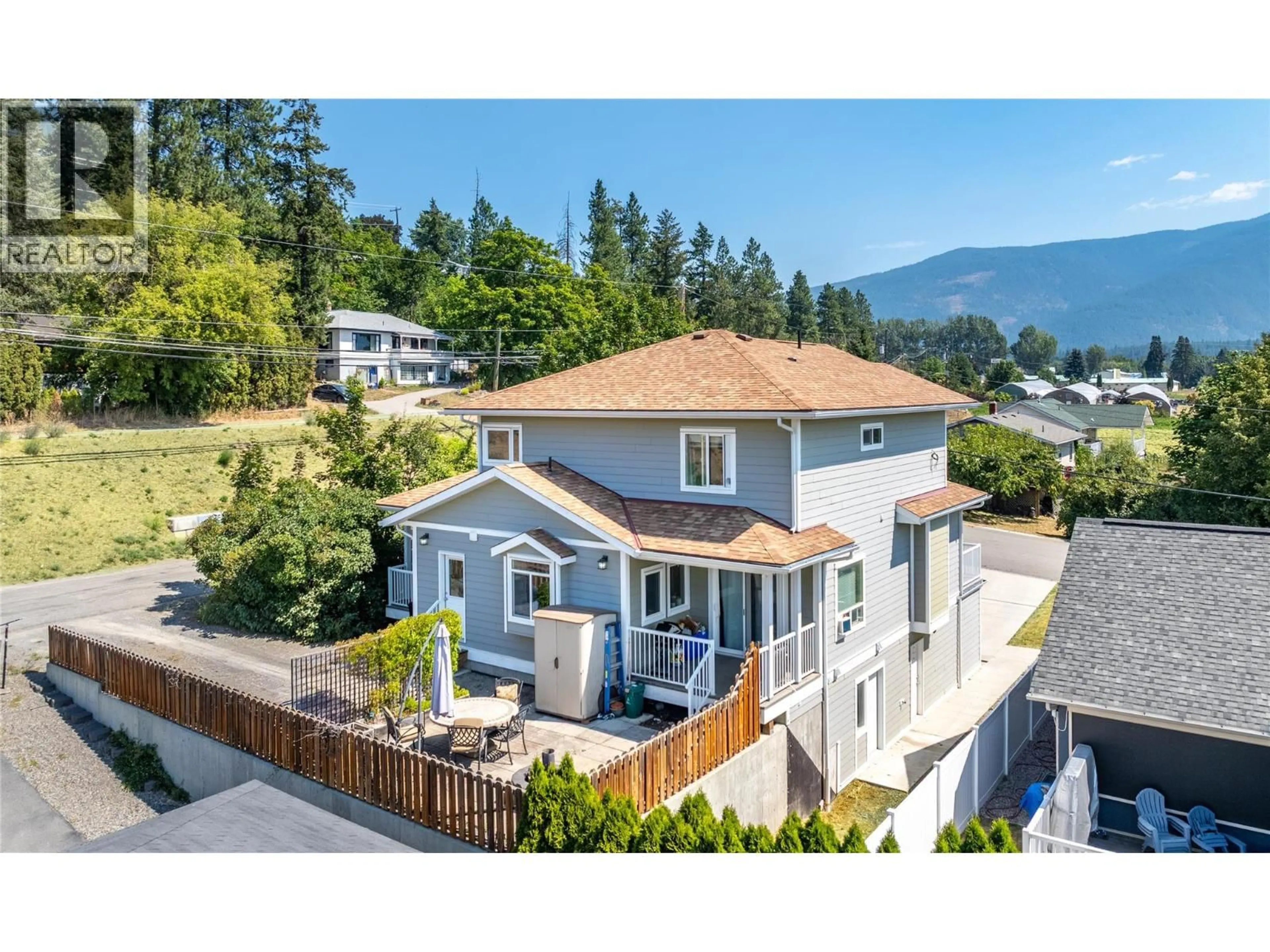 A pic from outside/outdoor area/front of a property/back of a property/a pic from drone, mountain view for 201 25TH AVENUE SOUTH, Creston British Columbia V0B1G5