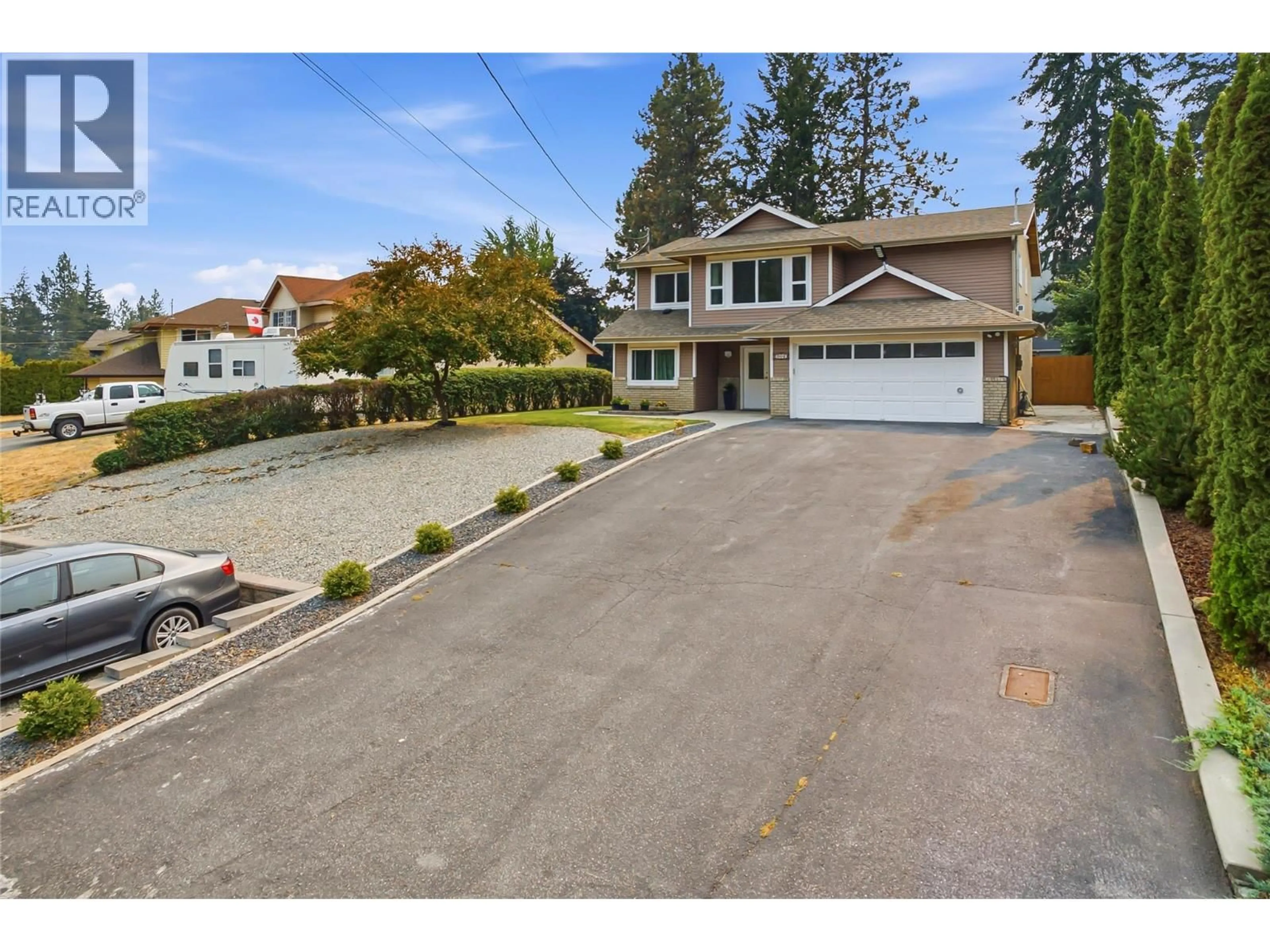 A pic from outside/outdoor area/front of a property/back of a property/a pic from drone, street for 3140 COVENTRY CRESCENT, West Kelowna British Columbia V4T1E3