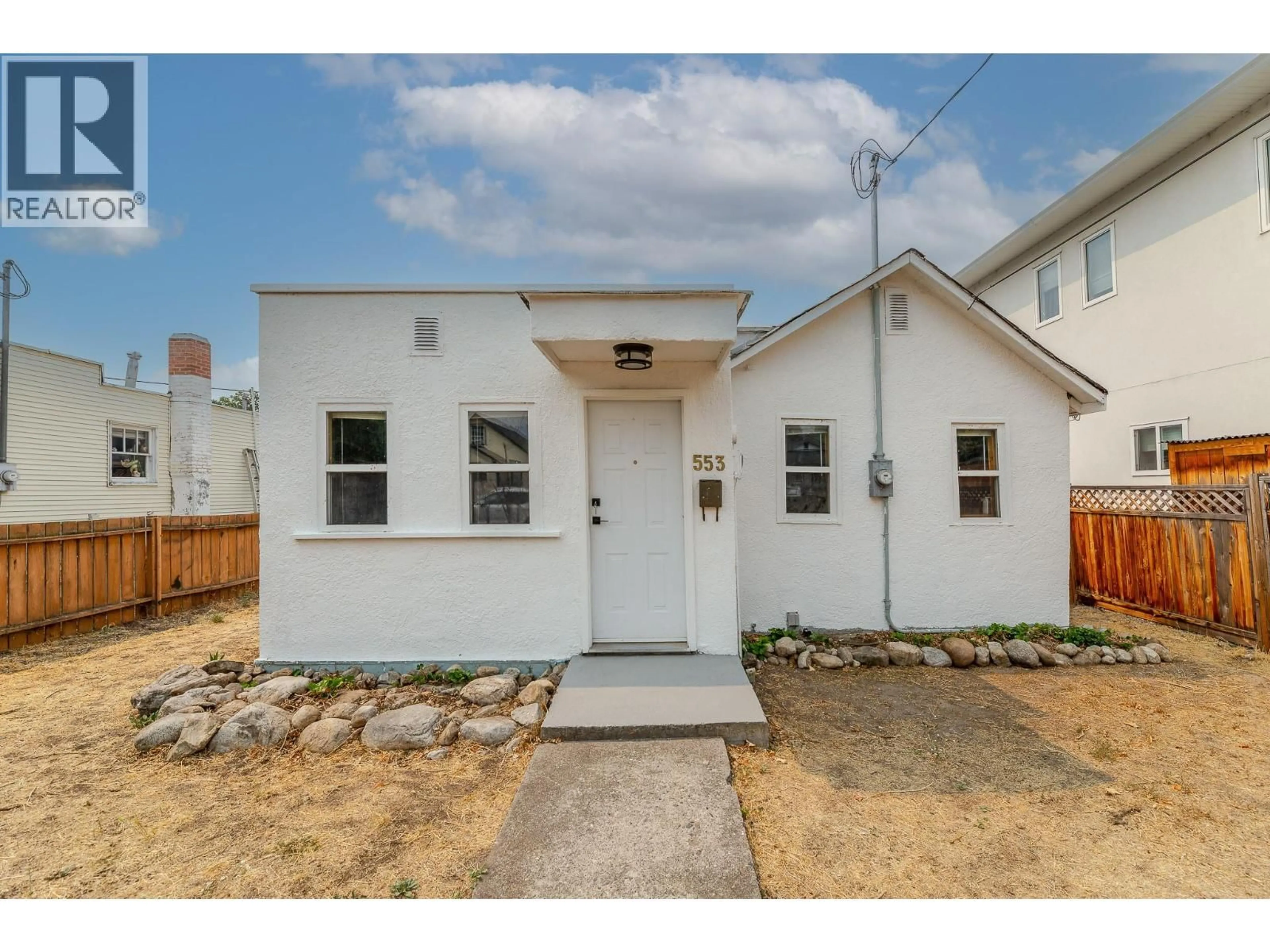 Home with vinyl exterior material, street for 553 PAPINEAU STREET, Penticton British Columbia V2A4X6