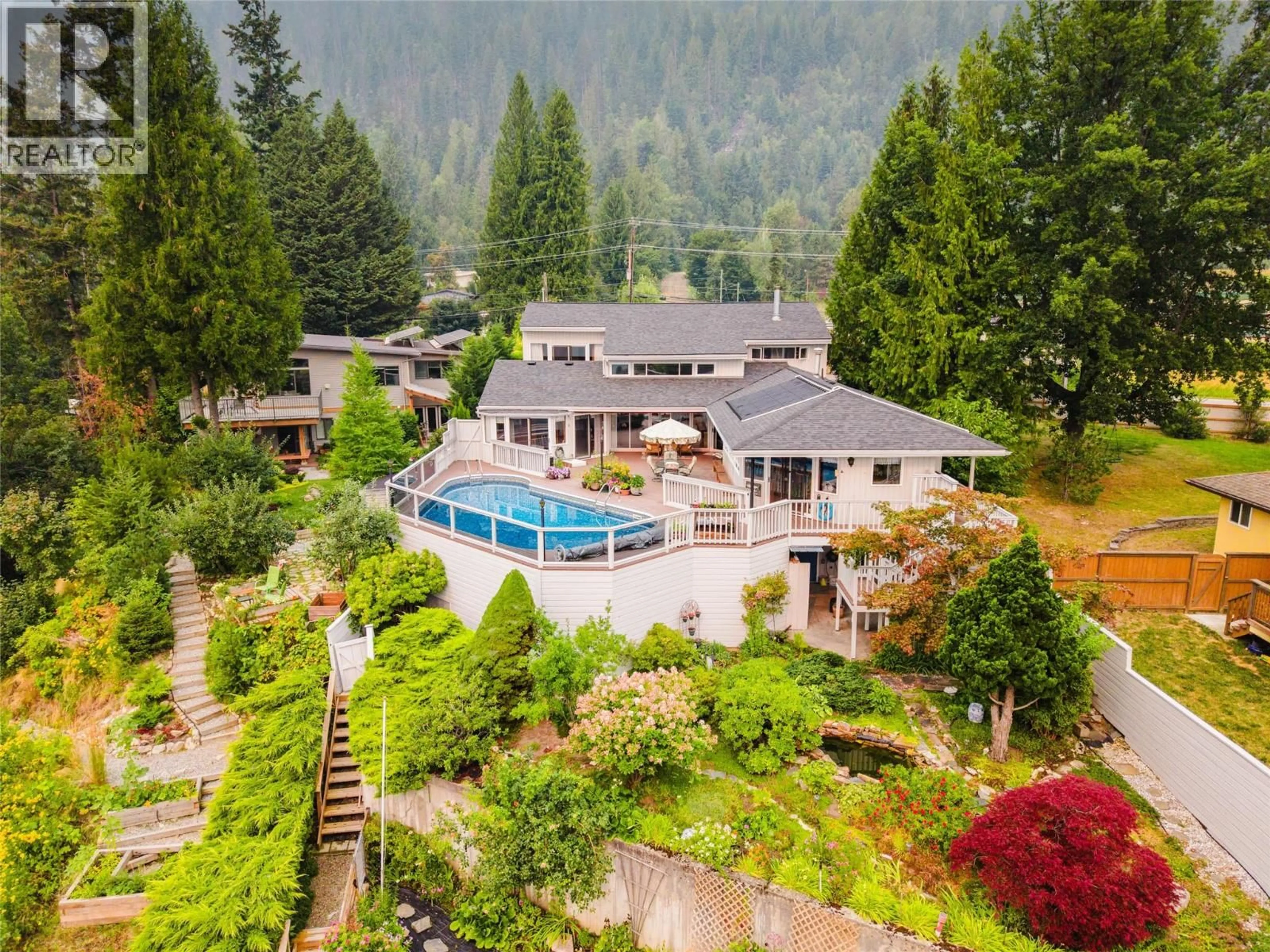 A pic from outside/outdoor area/front of a property/back of a property/a pic from drone, water/lake/river/ocean view for 1896 3A HIGHWAY, Nelson British Columbia V1L6K1