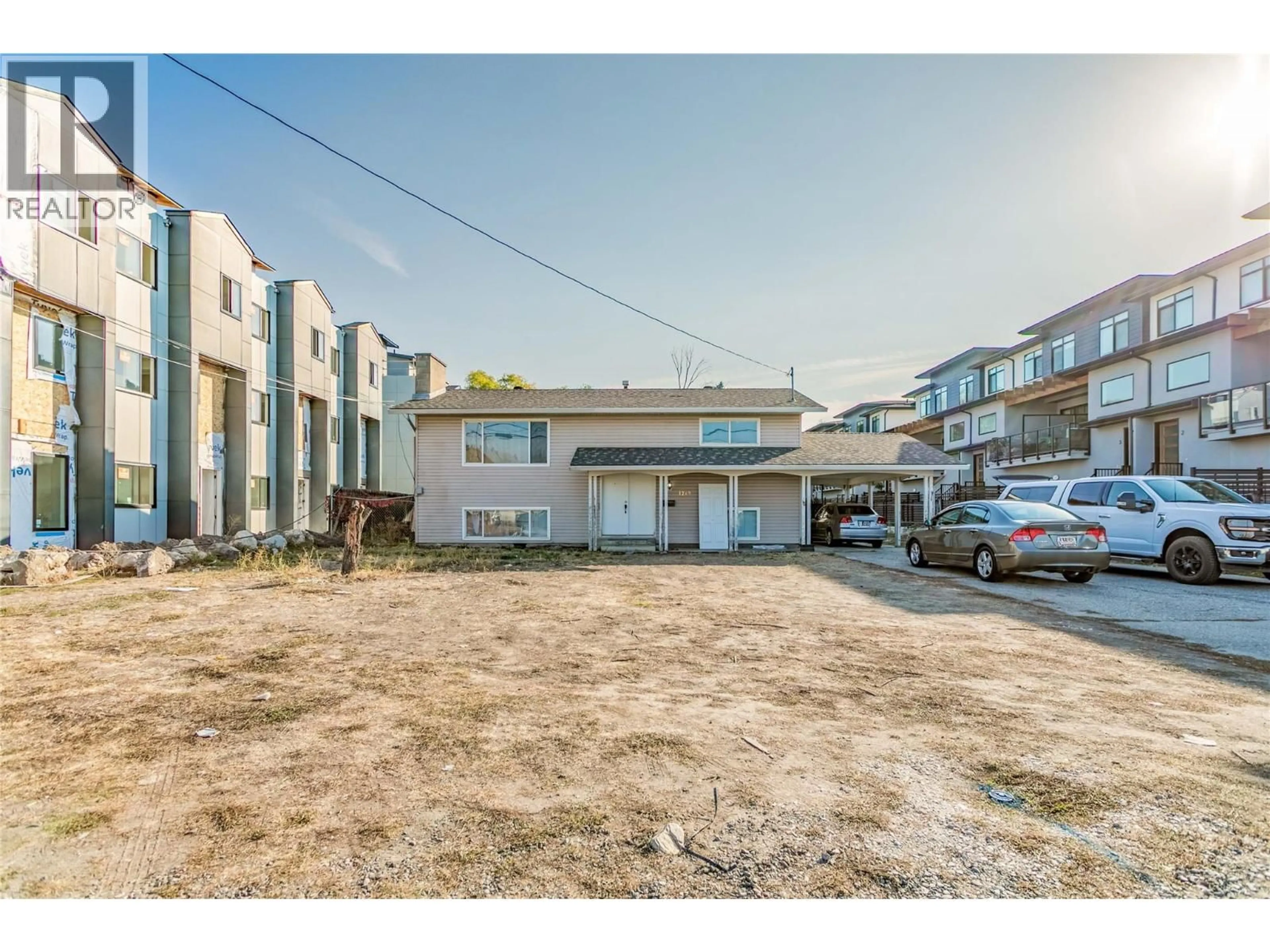A pic from outside/outdoor area/front of a property/back of a property/a pic from drone, street for 1269 FINDLAY ROAD, Kelowna British Columbia V1X5B1