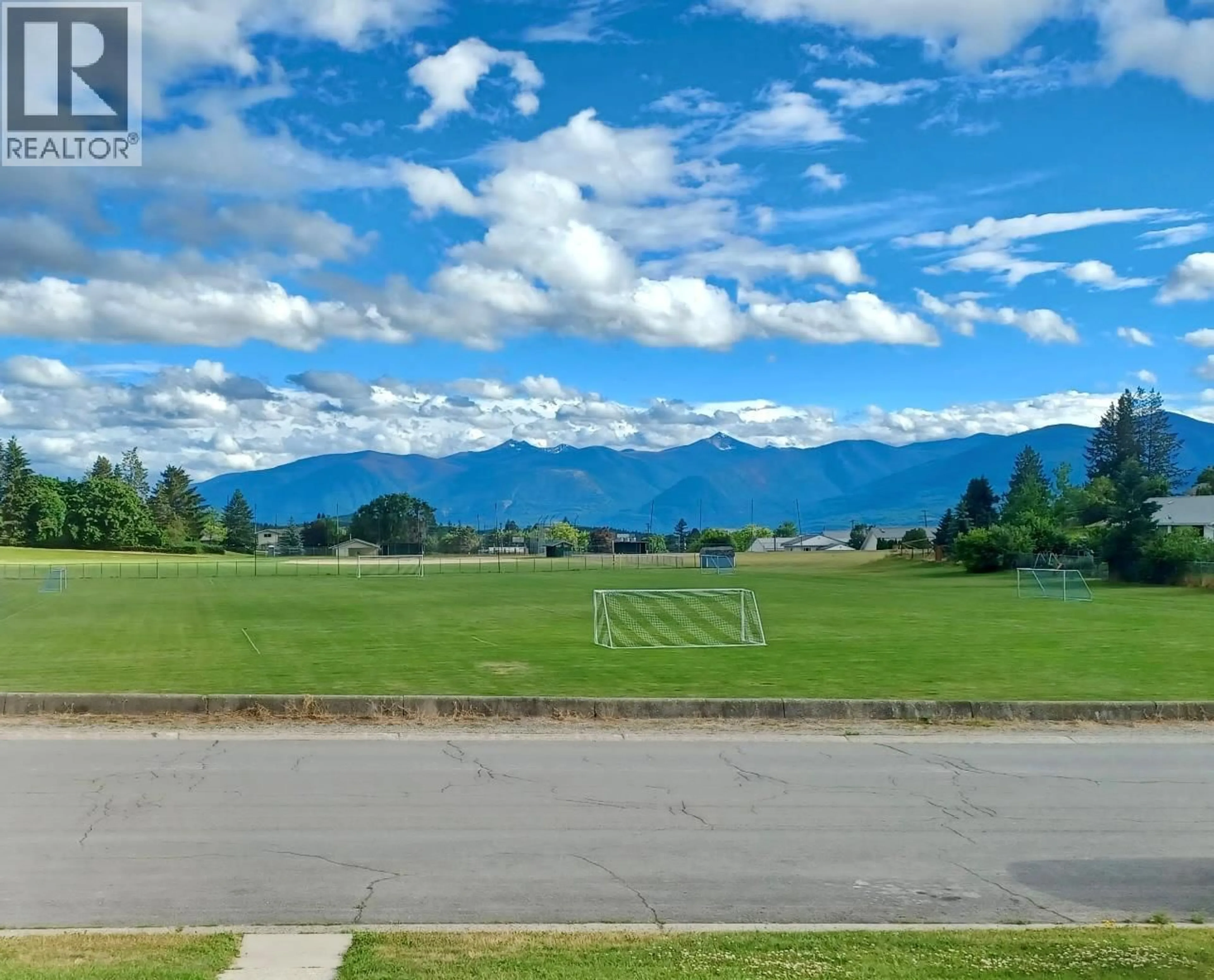 A pic from outside/outdoor area/front of a property/back of a property/a pic from drone, mountain view for 1740 HILLSIDE STREET, Creston British Columbia V0B1G5