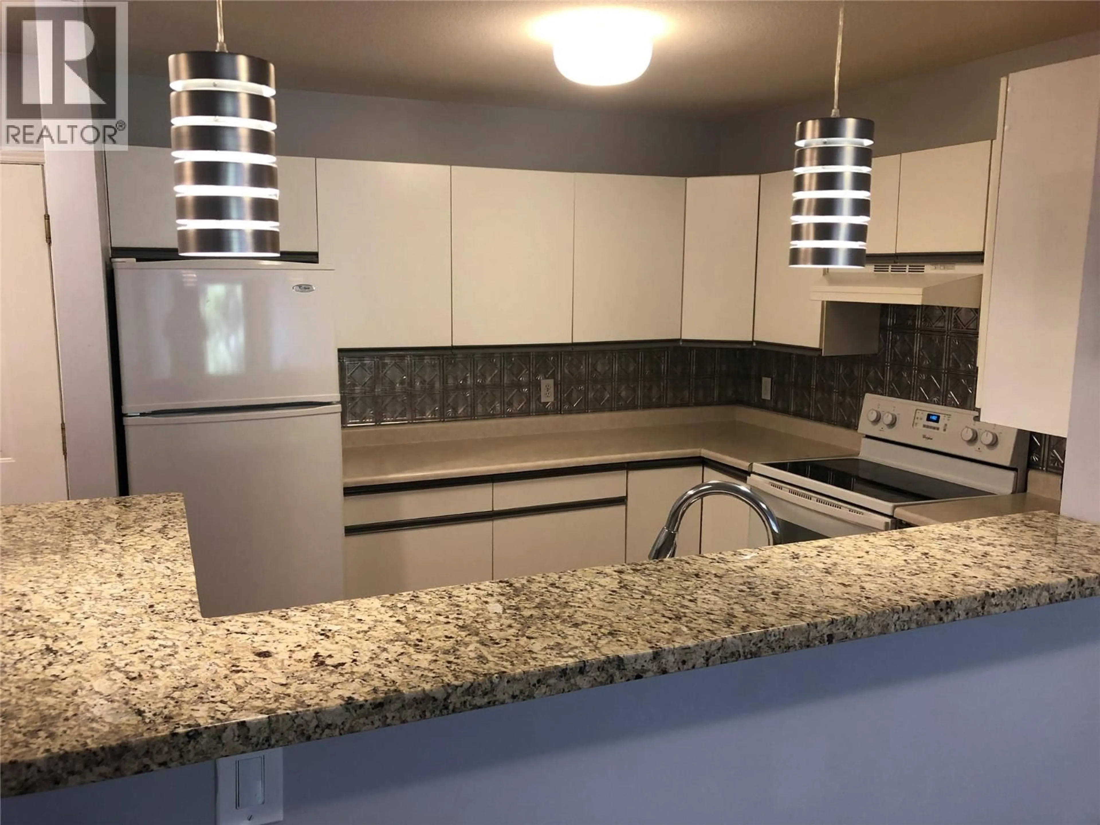 Standard kitchen, ceramic/tile floor for 310 - 400 SUTTON CRESCENT, Kelowna British Columbia V1V1Y3