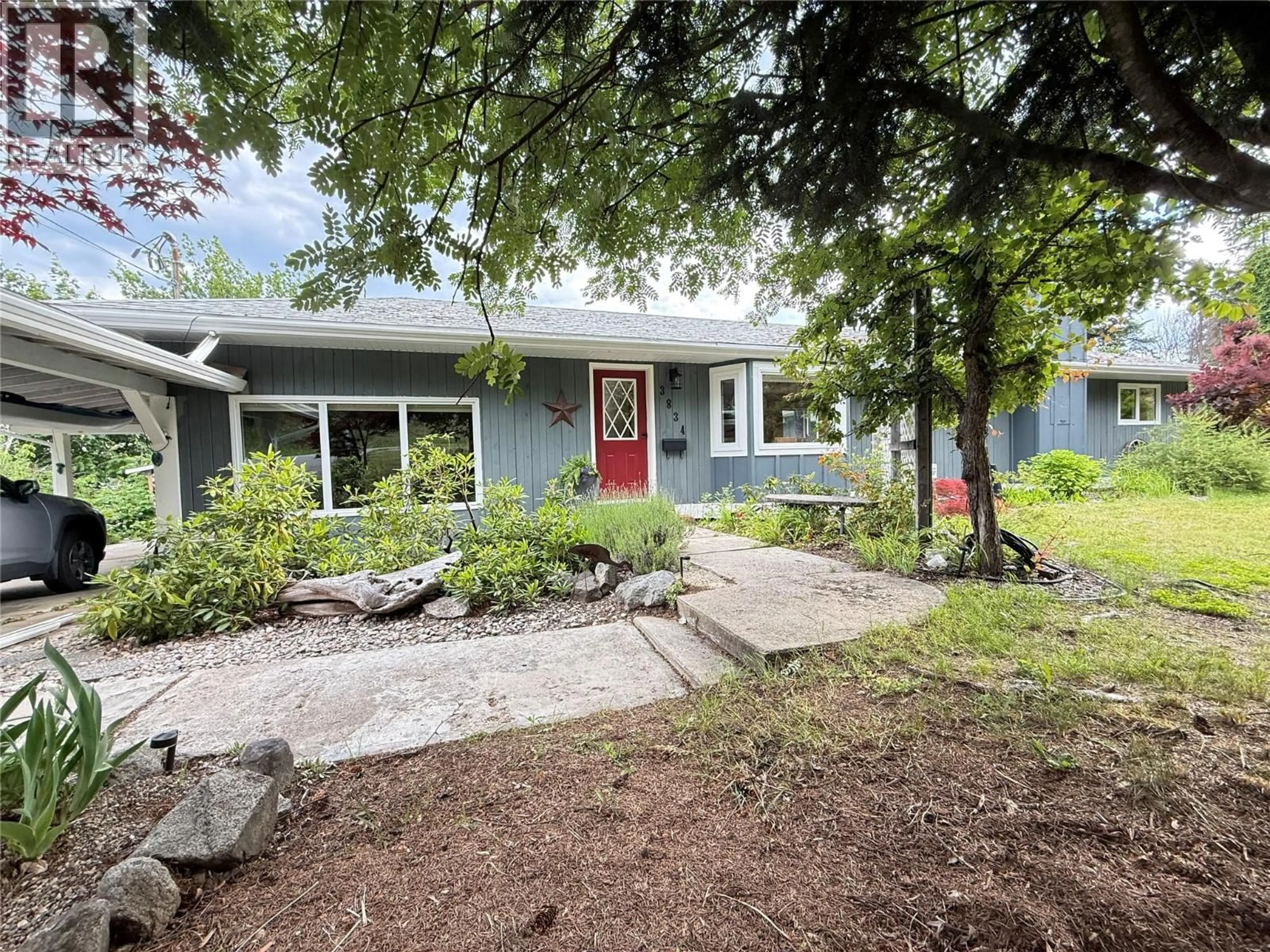 A pic from outside/outdoor area/front of a property/back of a property/a pic from drone, street for 3834 WOODCREST ROAD, Bonnington British Columbia V0G2G3