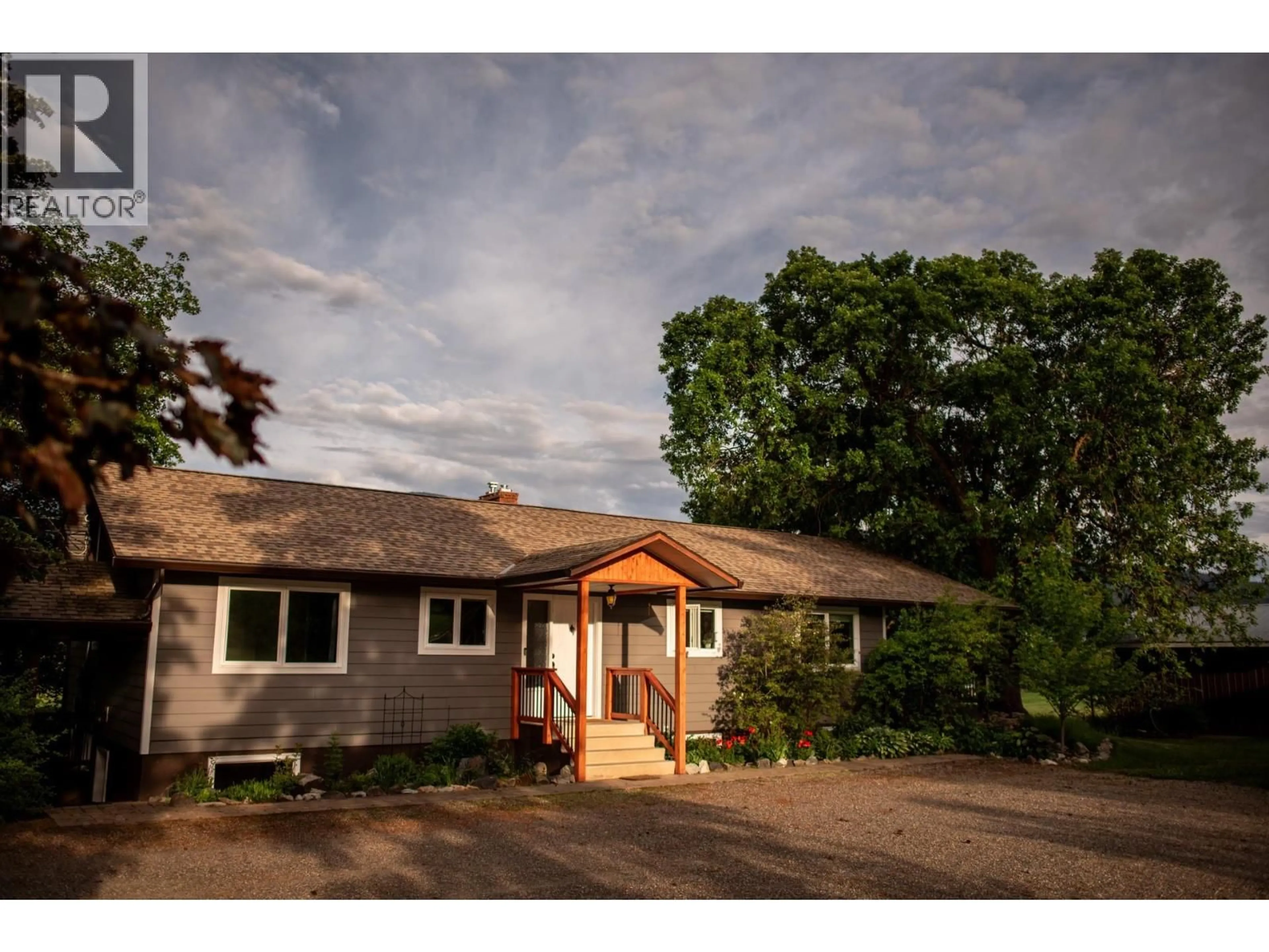 A pic from outside/outdoor area/front of a property/back of a property/a pic from drone, street for 4355 WALBRIDGE ROAD, Spallumcheen British Columbia V4Y0N4