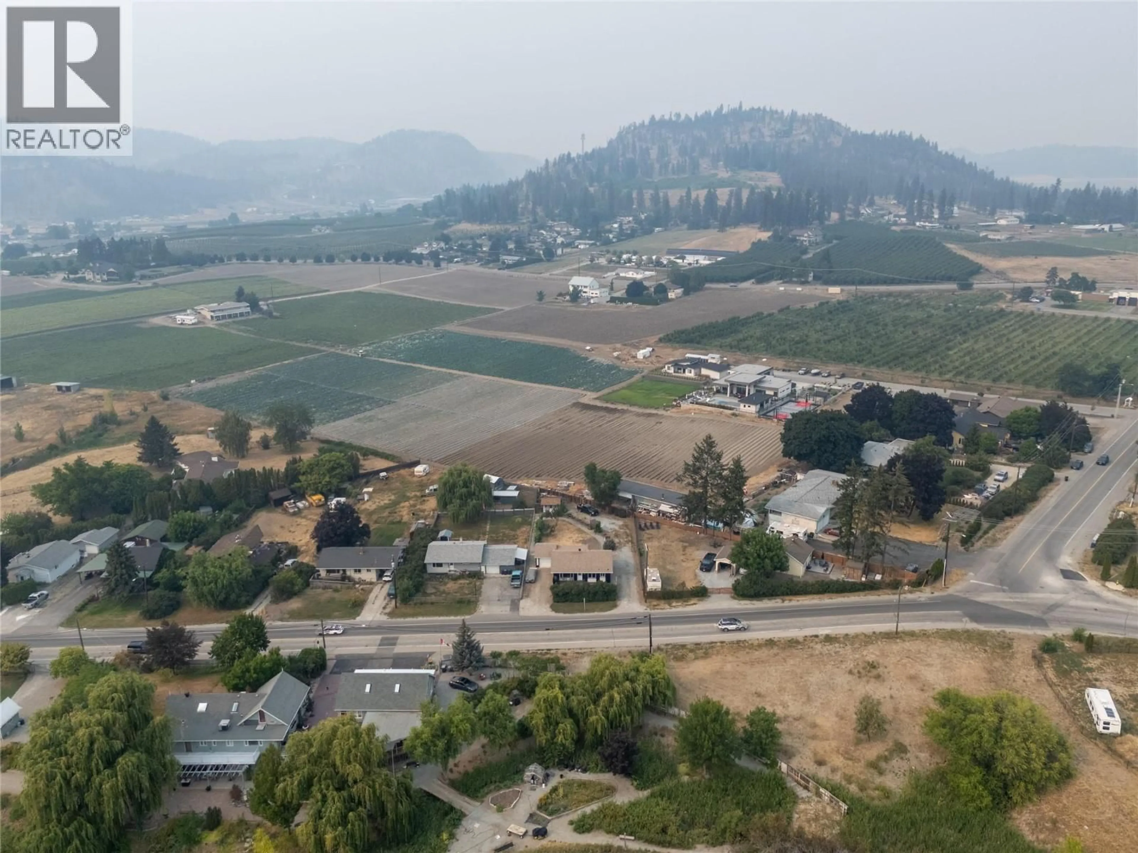 A pic from outside/outdoor area/front of a property/back of a property/a pic from drone, mountain view for 292 VALLEY ROAD NORTH, Kelowna British Columbia V1V2G1