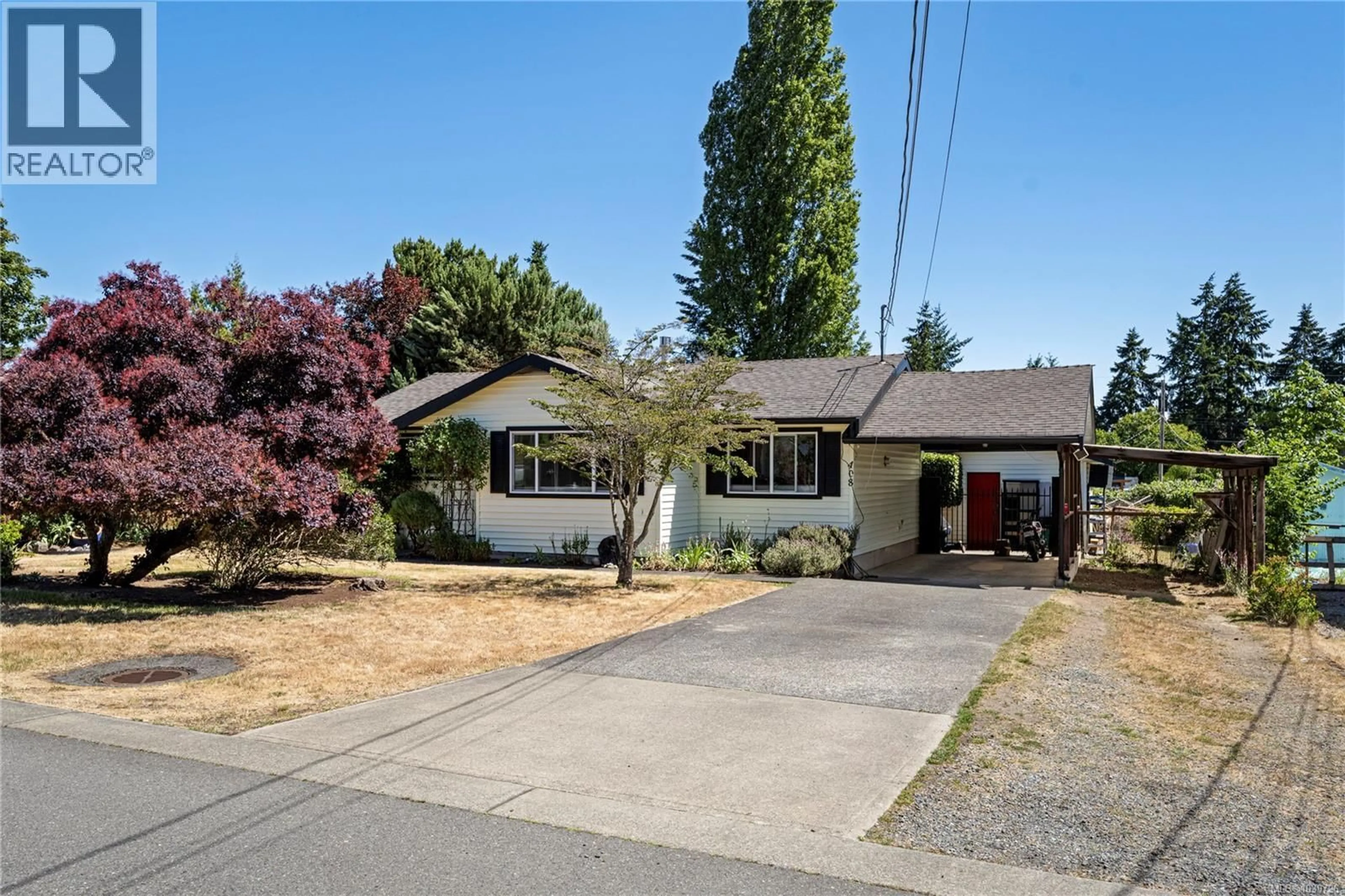 Home with vinyl exterior material, street for 408 YOUNG STREET, Parksville British Columbia V9P1C3