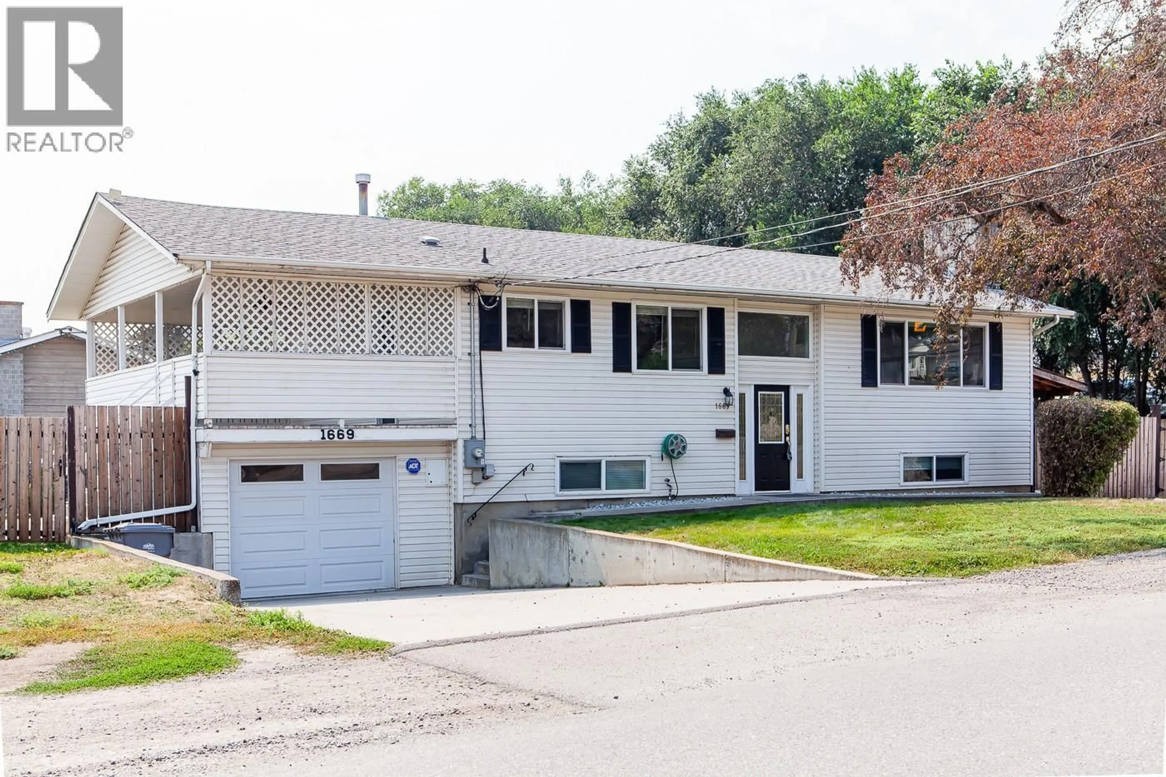 Home with vinyl exterior material, street for 1669 WESTMOUNT DRIVE, Kamloops British Columbia V2B6A4