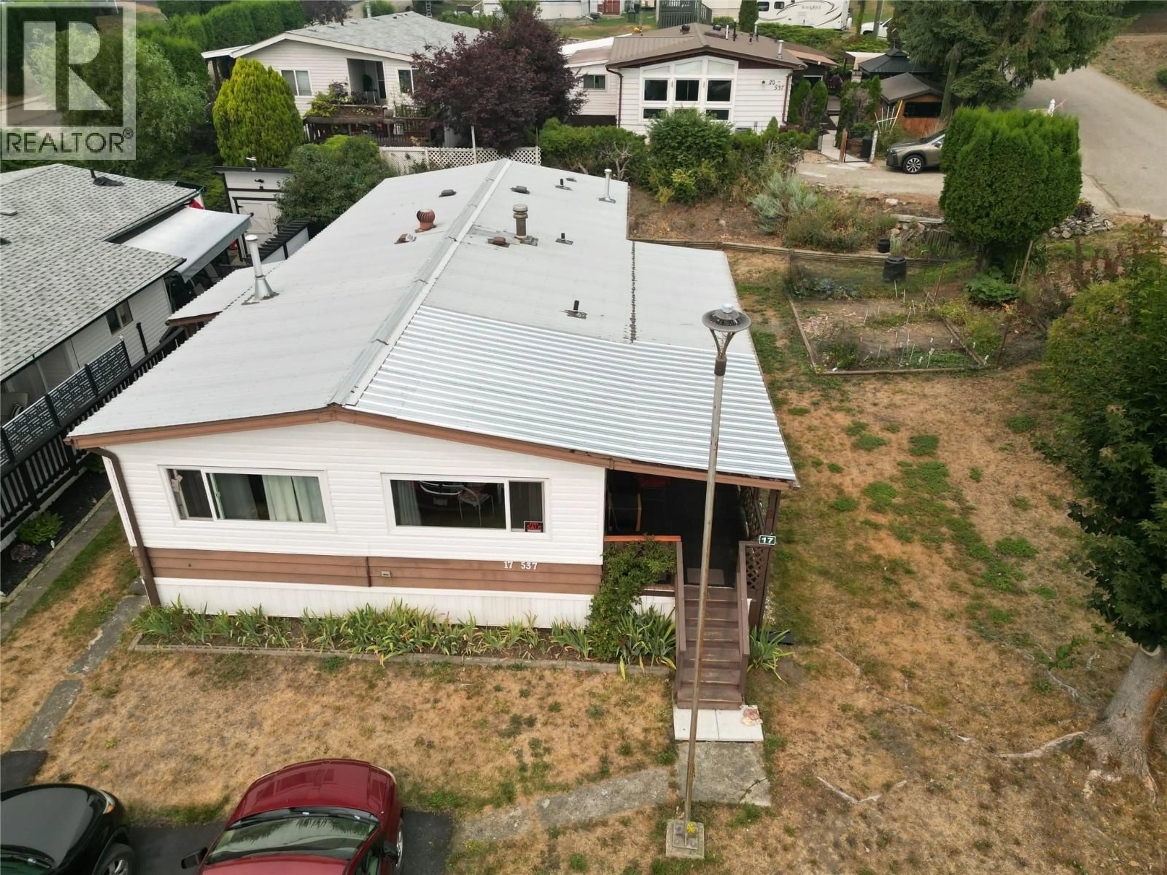 A pic from outside/outdoor area/front of a property/back of a property/a pic from drone, unknown for 17 - 537 BEGBIE ROAD, Tappen British Columbia V0E2X1