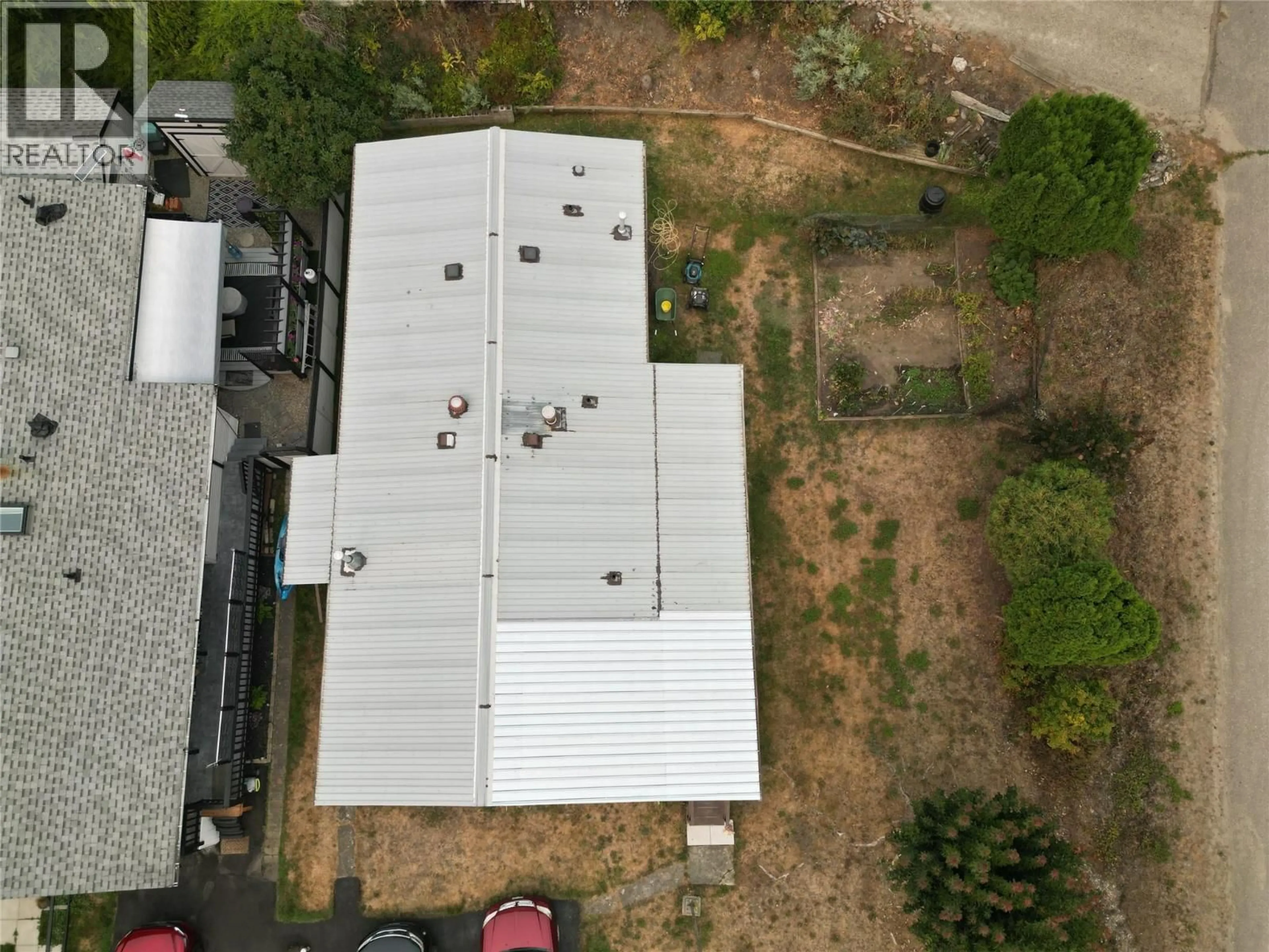 A pic from outside/outdoor area/front of a property/back of a property/a pic from drone, building for 17 - 537 BEGBIE ROAD, Tappen British Columbia V0E2X1
