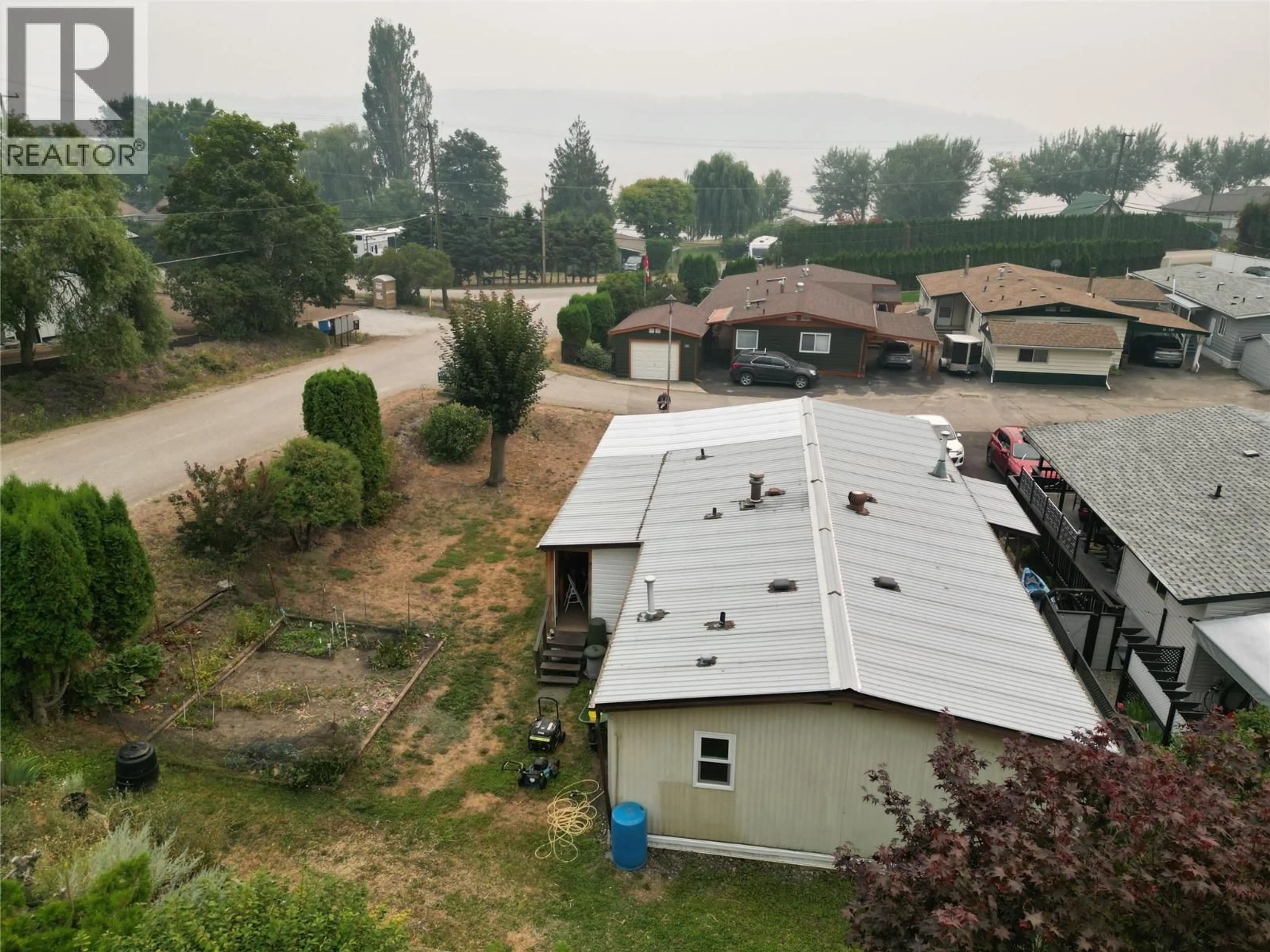A pic from outside/outdoor area/front of a property/back of a property/a pic from drone, unknown for 17 - 537 BEGBIE ROAD, Tappen British Columbia V0E2X1