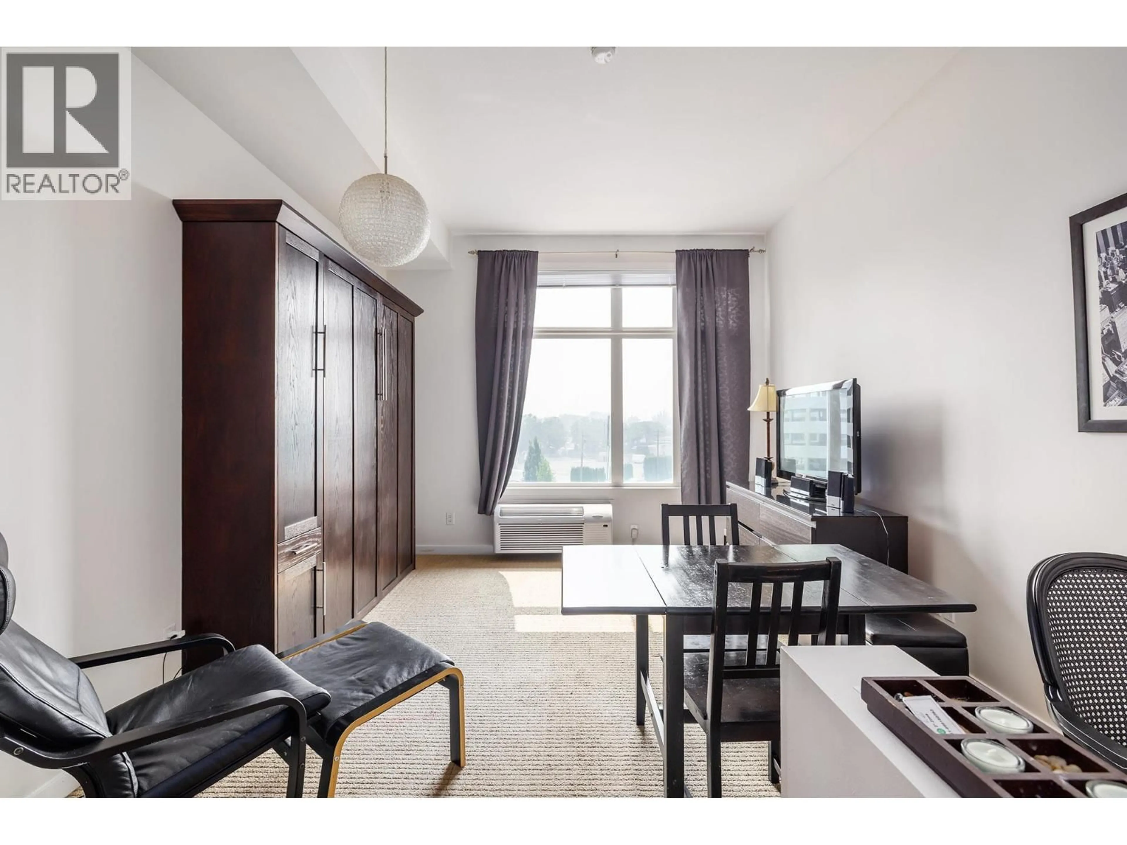 Living room with furniture, unknown for 405 - 1550 DICKSON AVENUE, Kelowna British Columbia V1Y9Y8