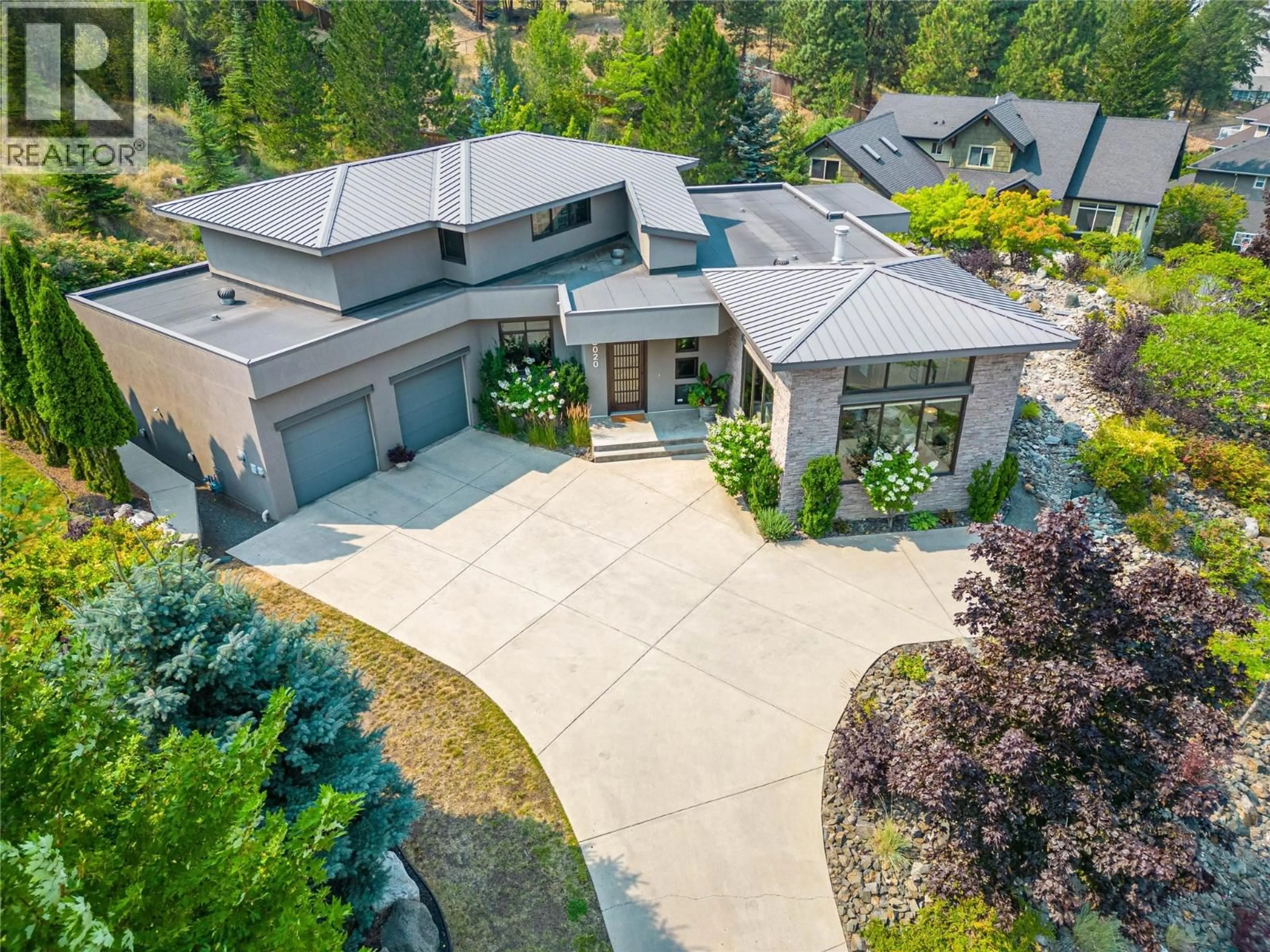 A pic from outside/outdoor area/front of a property/back of a property/a pic from drone, mountain view for 3020 KICKING HORSE DRIVE, Kamloops British Columbia V2E2T6