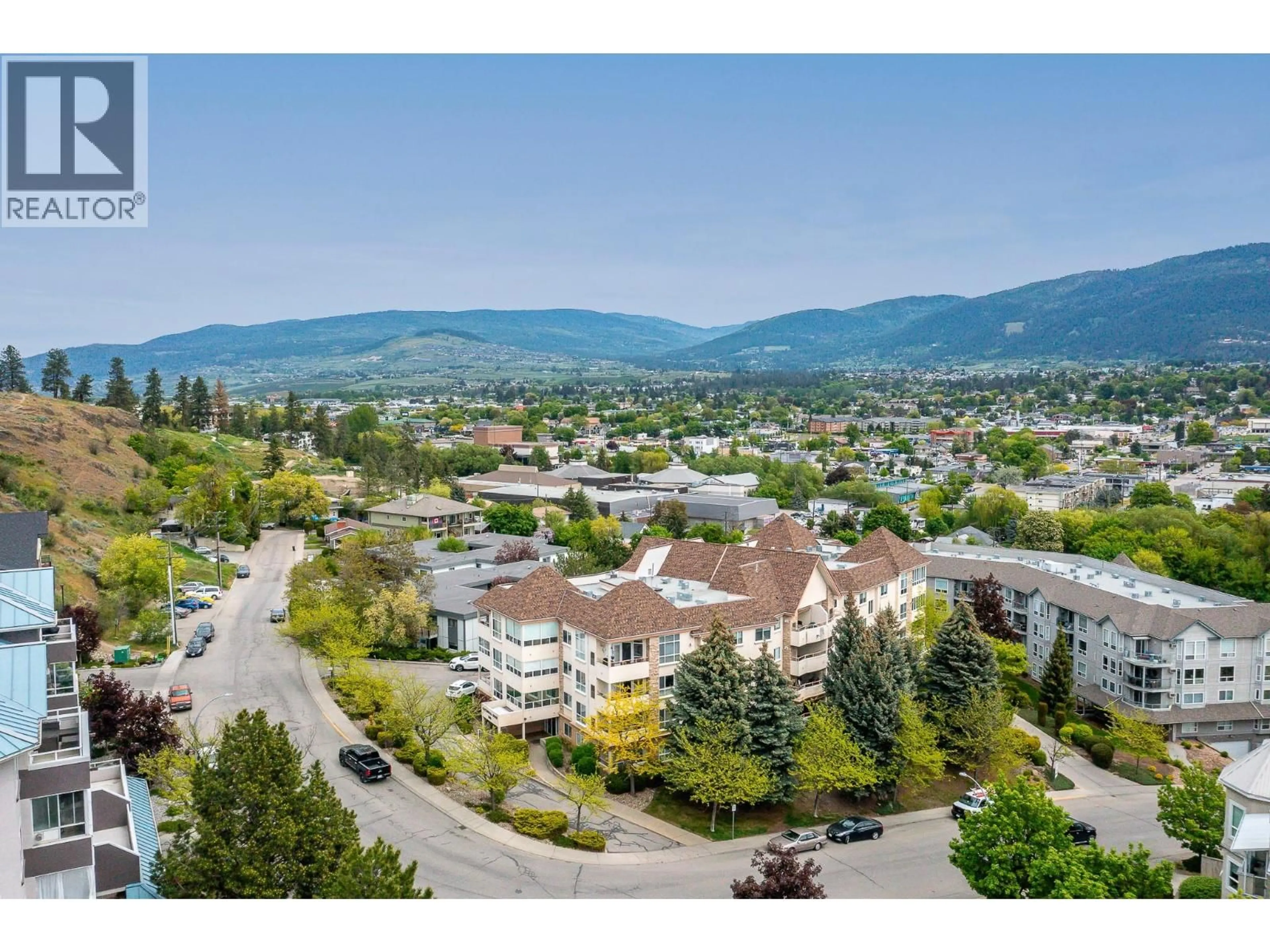A pic from outside/outdoor area/front of a property/back of a property/a pic from drone, mountain view for 309 - 3301 CENTENNIAL DRIVE, Vernon British Columbia V1T2T8