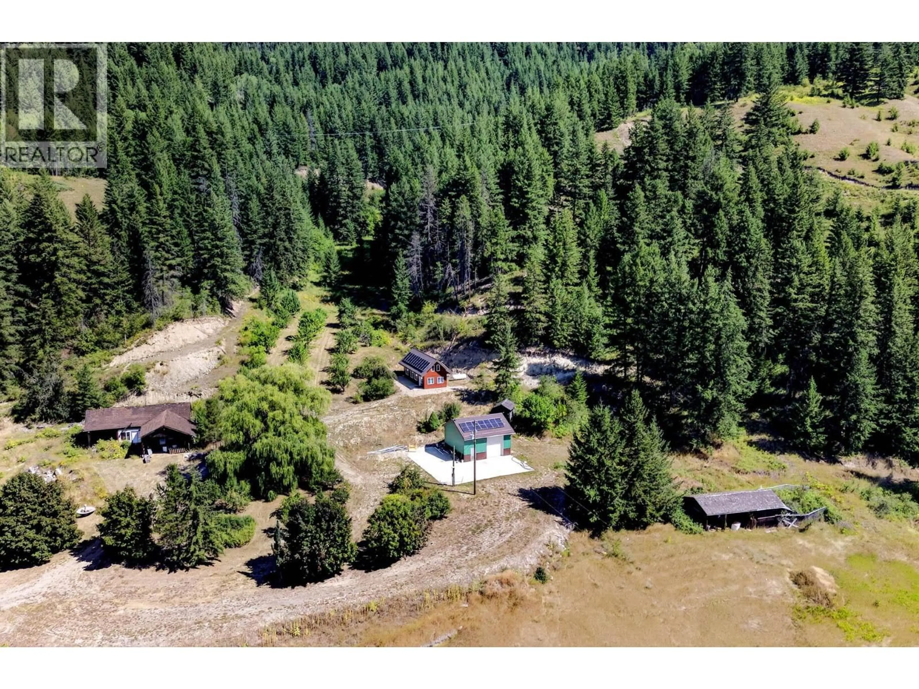 A pic from outside/outdoor area/front of a property/back of a property/a pic from drone, forest/trees view for 1711 BURMAN ROAD, Clearwater British Columbia V0E1N0