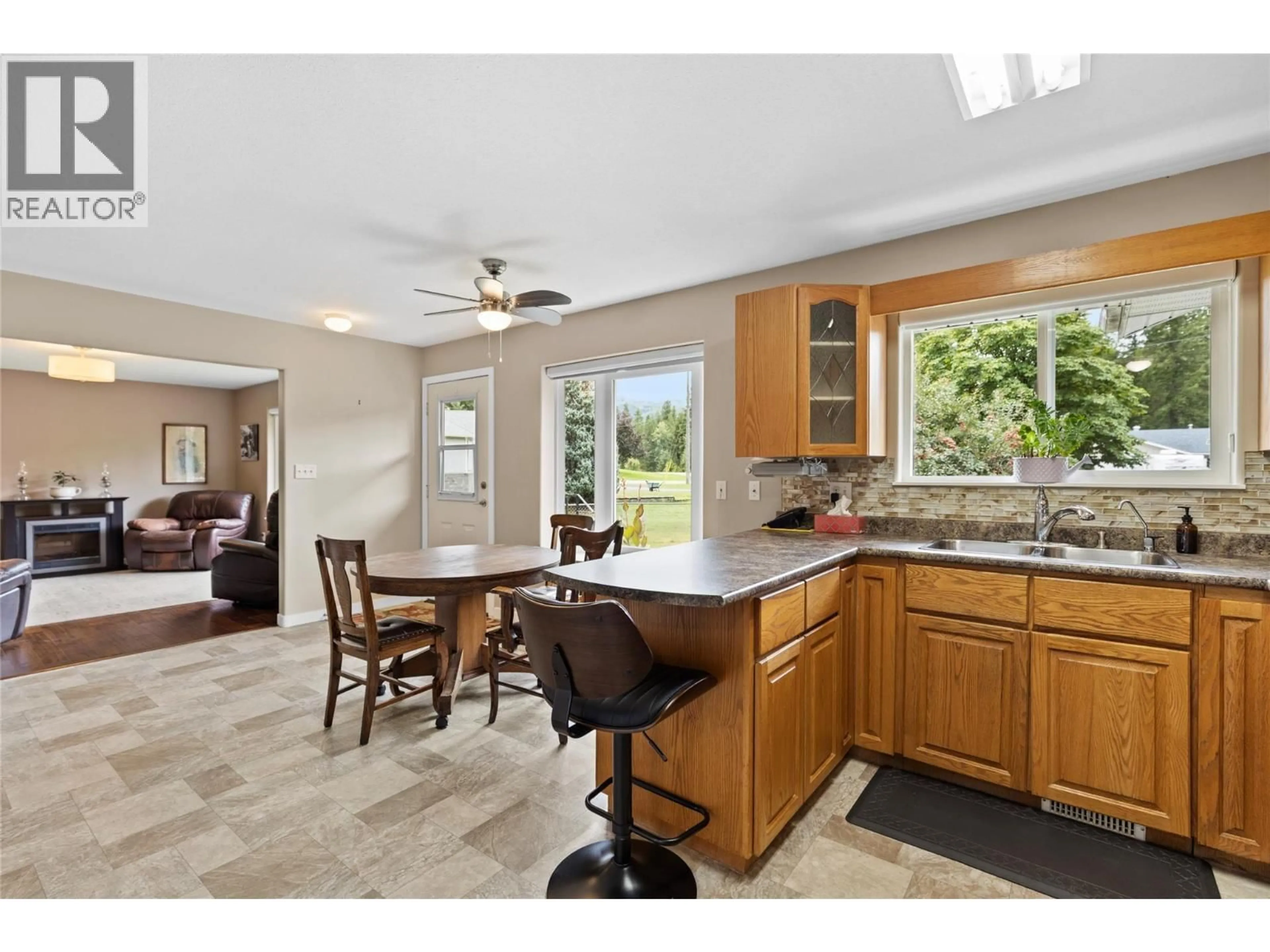 Open concept kitchen, ceramic/tile floor for 325 WYNDHAVEN DRIVE, Clearwater British Columbia V0E1N1