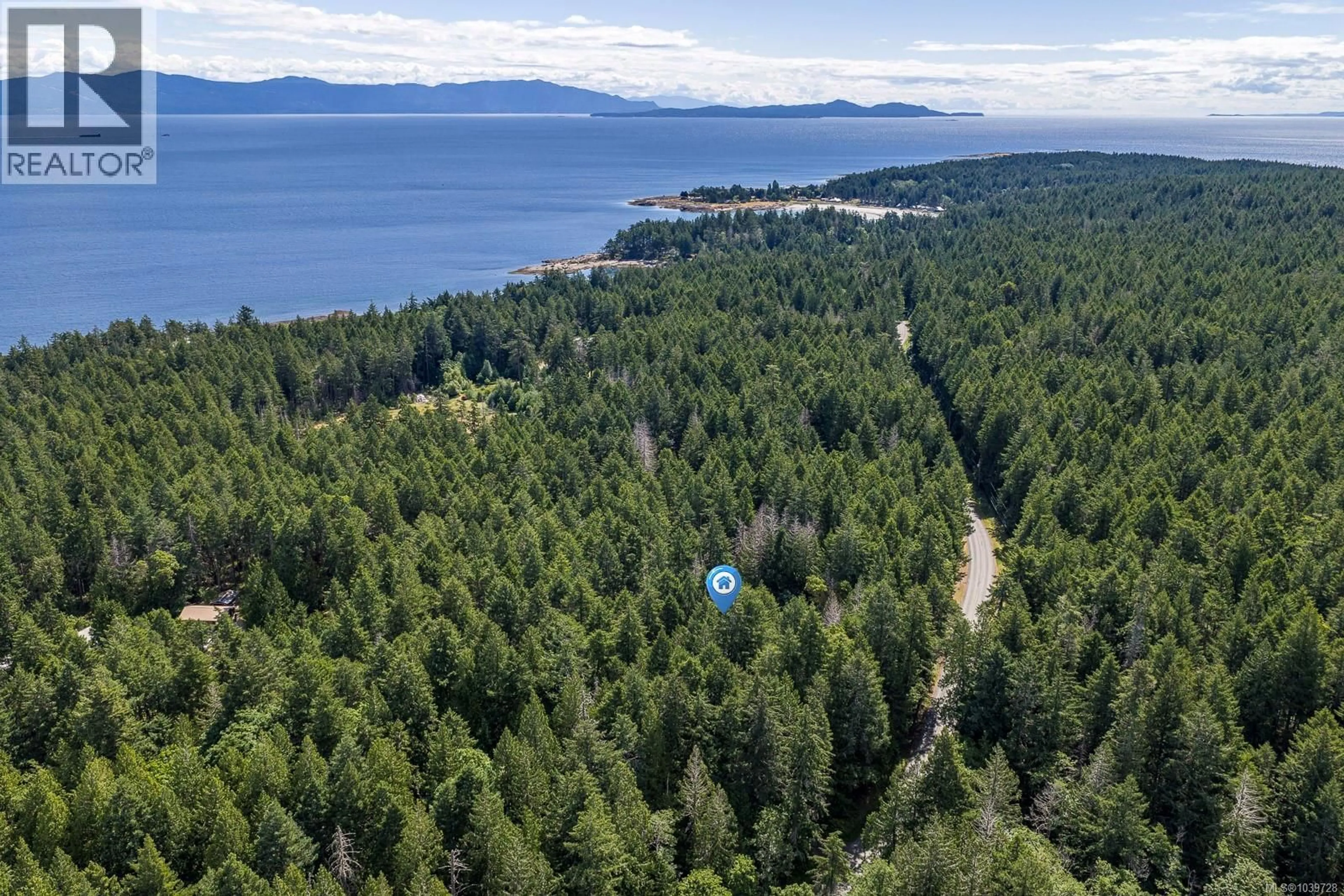 A pic from outside/outdoor area/front of a property/back of a property/a pic from drone, forest/trees view for 6535 ST JOHNS POINT ROAD, Hornby Island British Columbia V0R1Z0