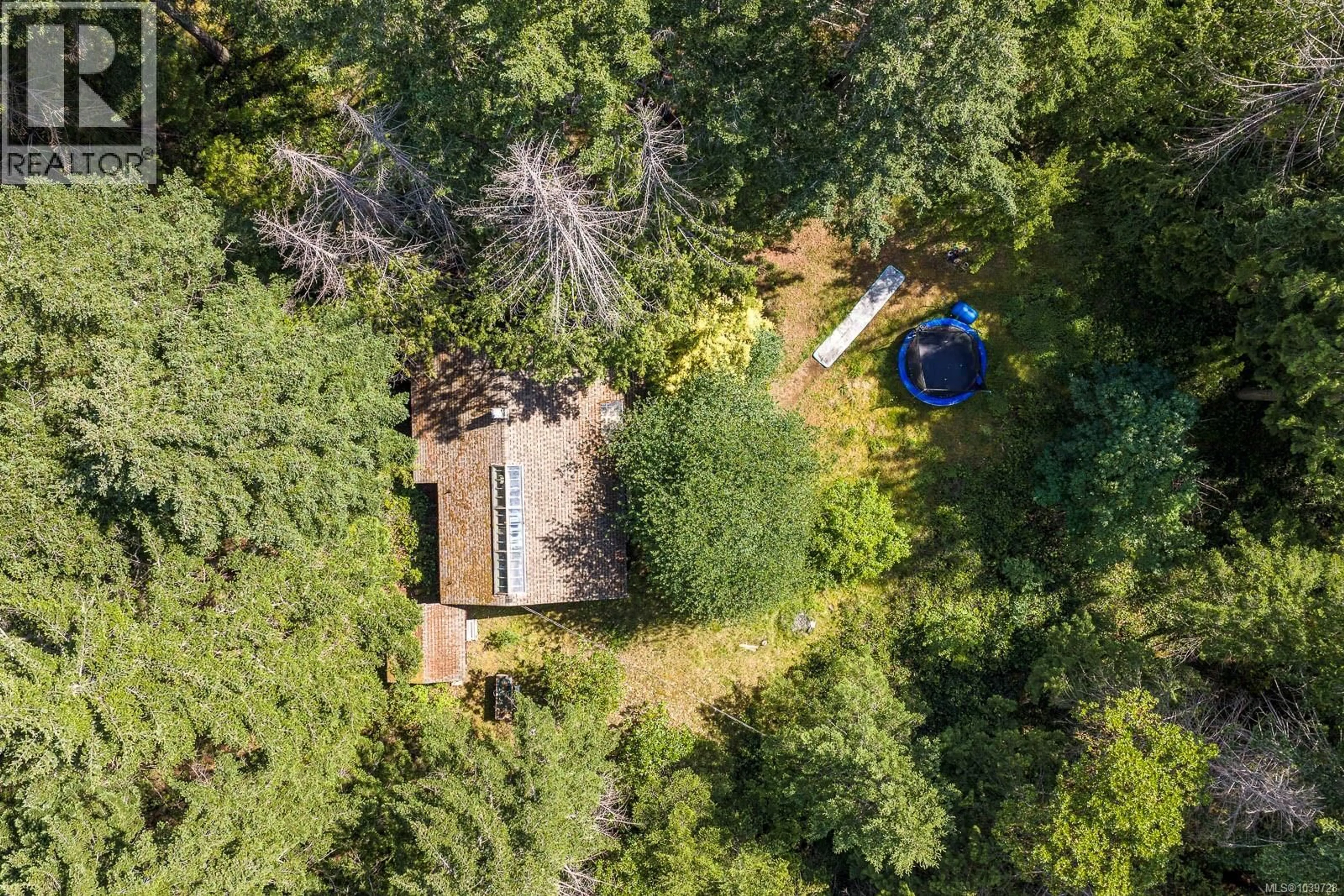 A pic from outside/outdoor area/front of a property/back of a property/a pic from drone, forest/trees view for 6535 ST JOHNS POINT ROAD, Hornby Island British Columbia V0R1Z0