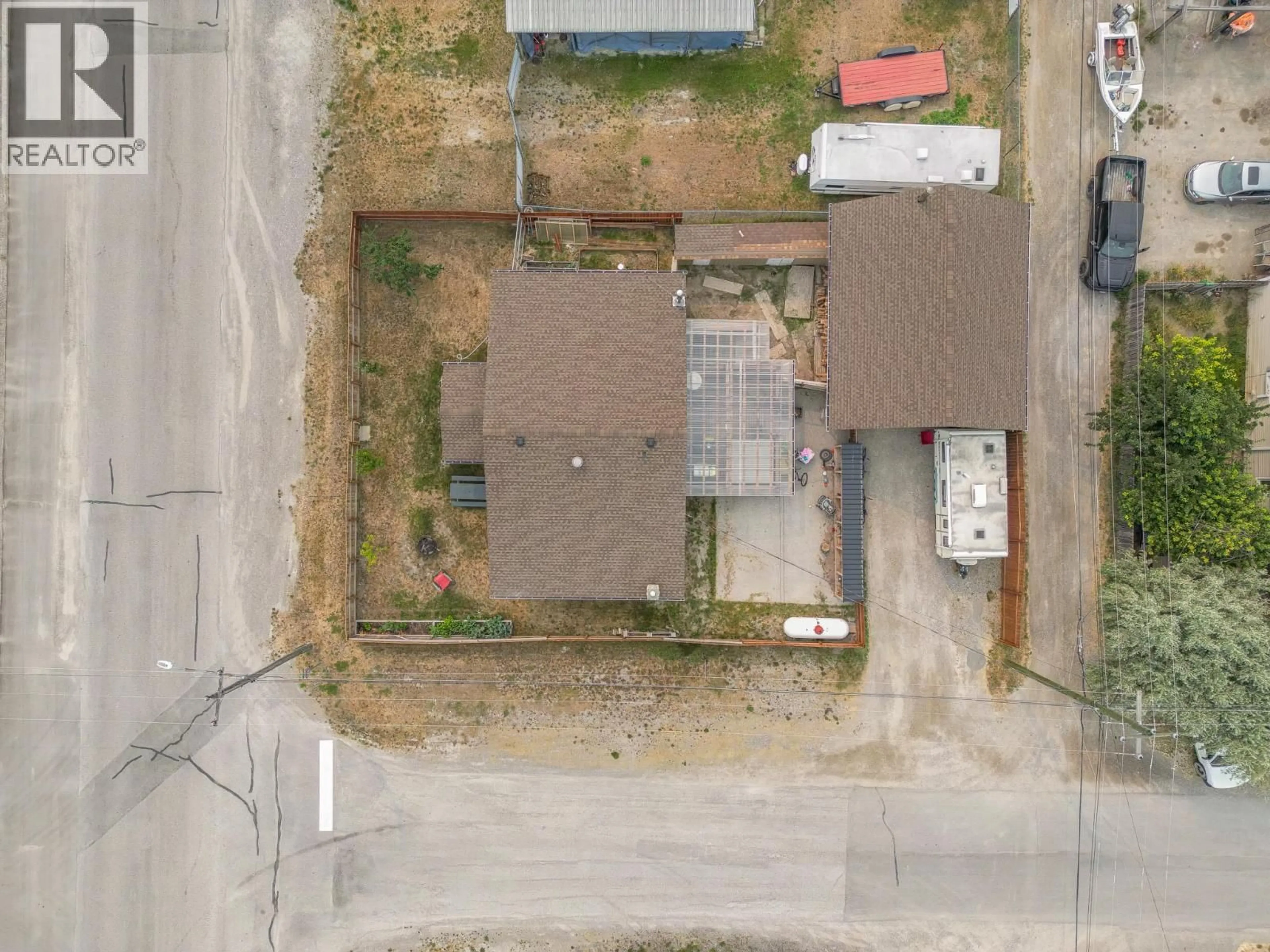 A pic from outside/outdoor area/front of a property/back of a property/a pic from drone, street for 8909 GRAINGER ROAD, Canal Flats British Columbia V0B1B0