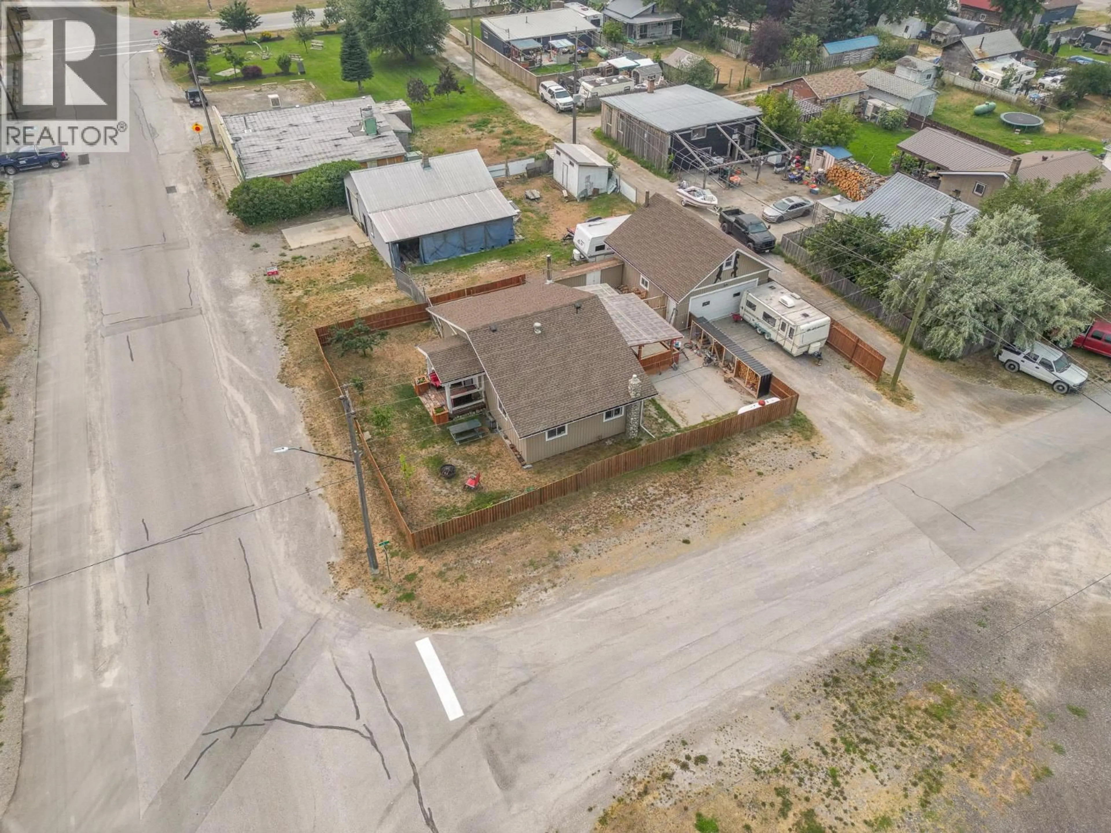 A pic from outside/outdoor area/front of a property/back of a property/a pic from drone, street for 8909 GRAINGER ROAD, Canal Flats British Columbia V0B1B0