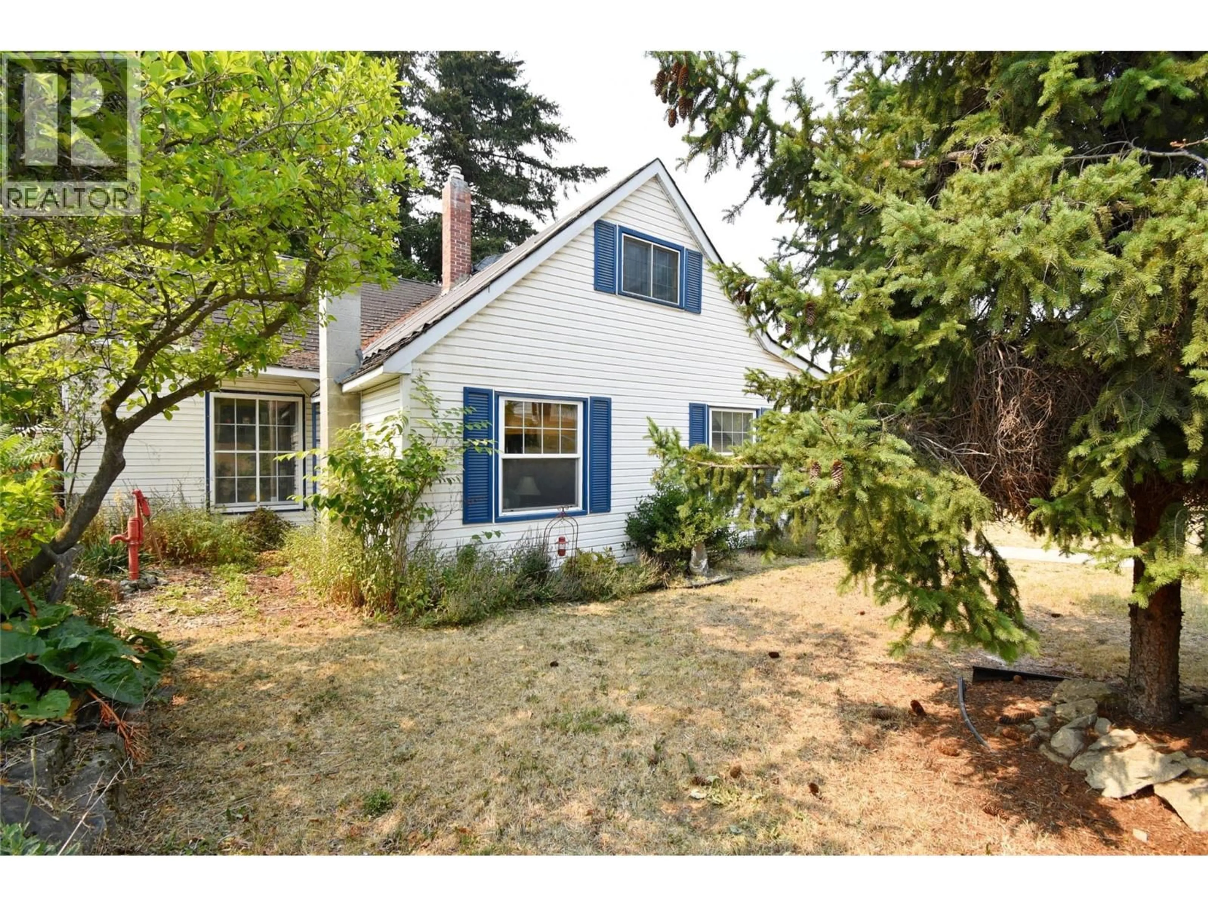 Home with vinyl exterior material, street for 3202 22 STREET, Vernon British Columbia V1T4H8