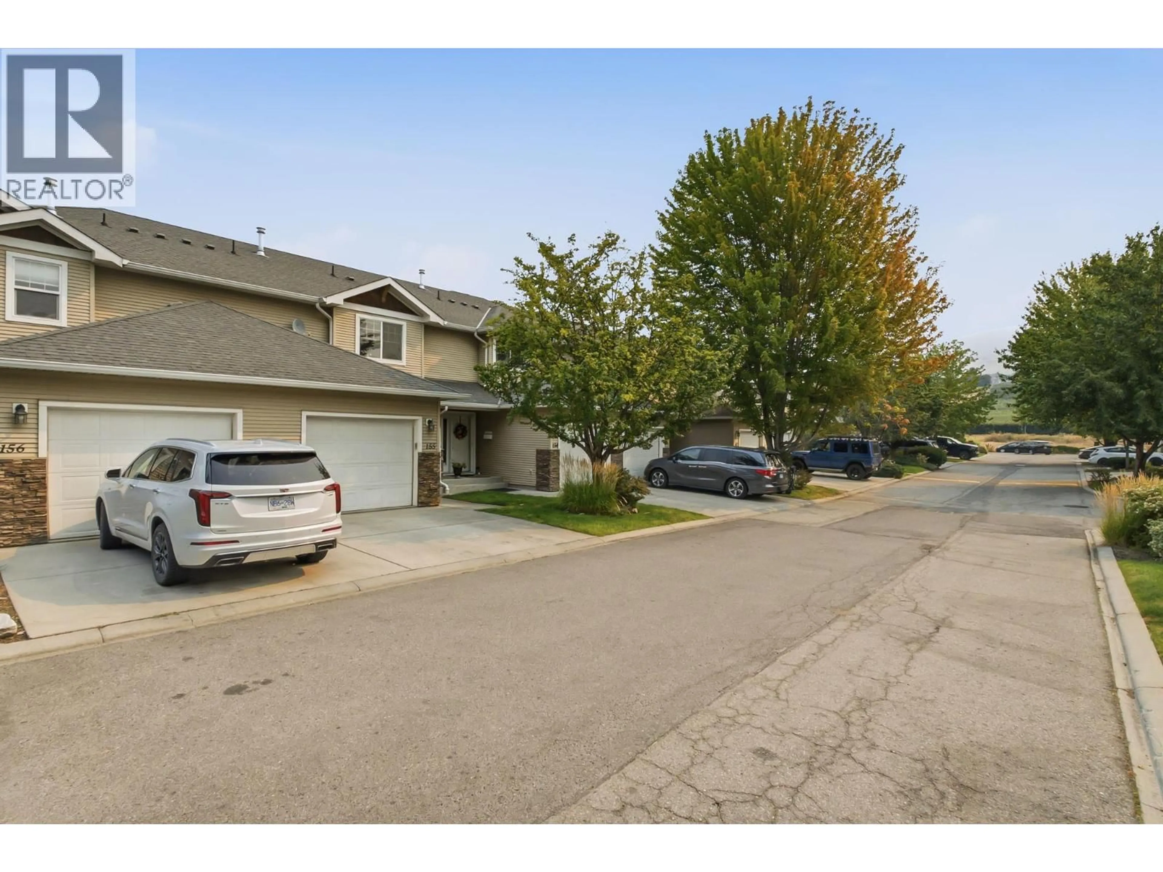 A pic from outside/outdoor area/front of a property/back of a property/a pic from drone, street for 155 - 914 CRAIG ROAD, Kelowna British Columbia V1X7Z7