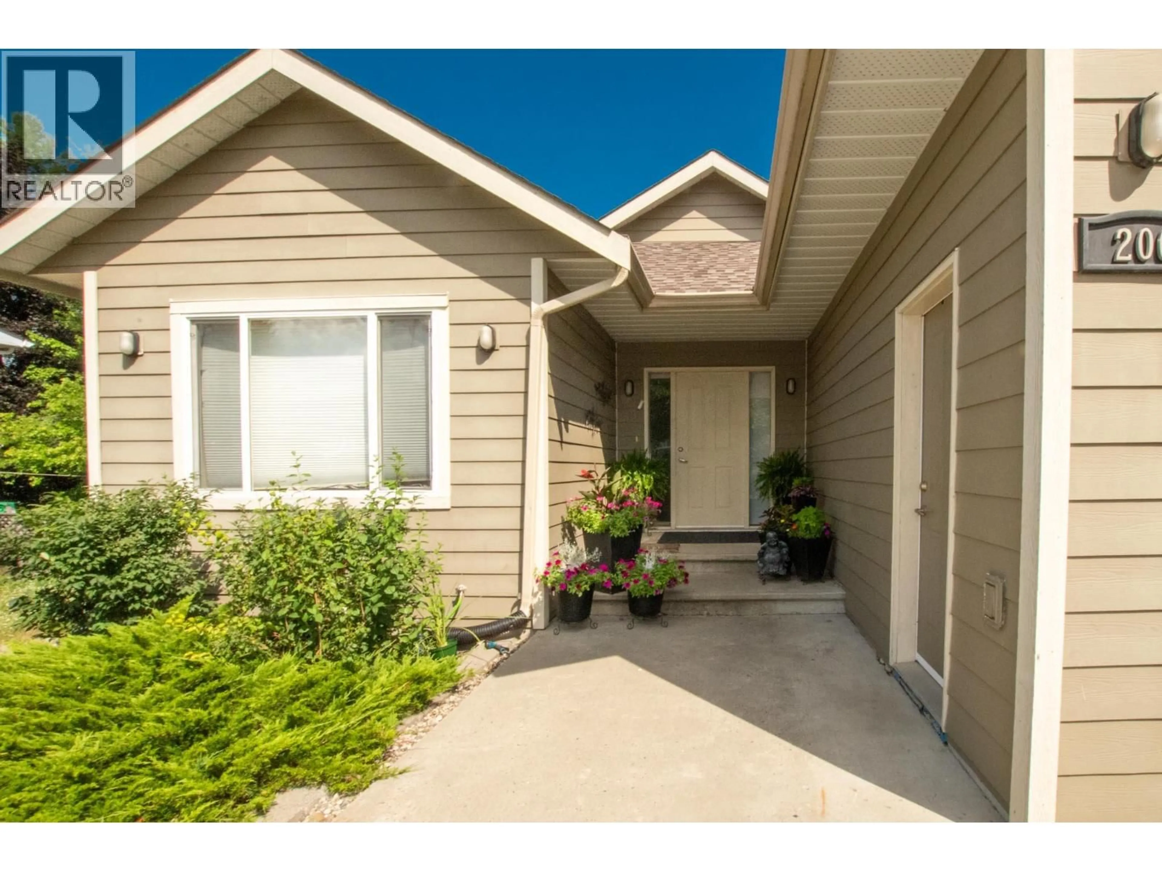 Home with vinyl exterior material, street for 206 MURTLE ROAD, Clearwater British Columbia V0E1N1